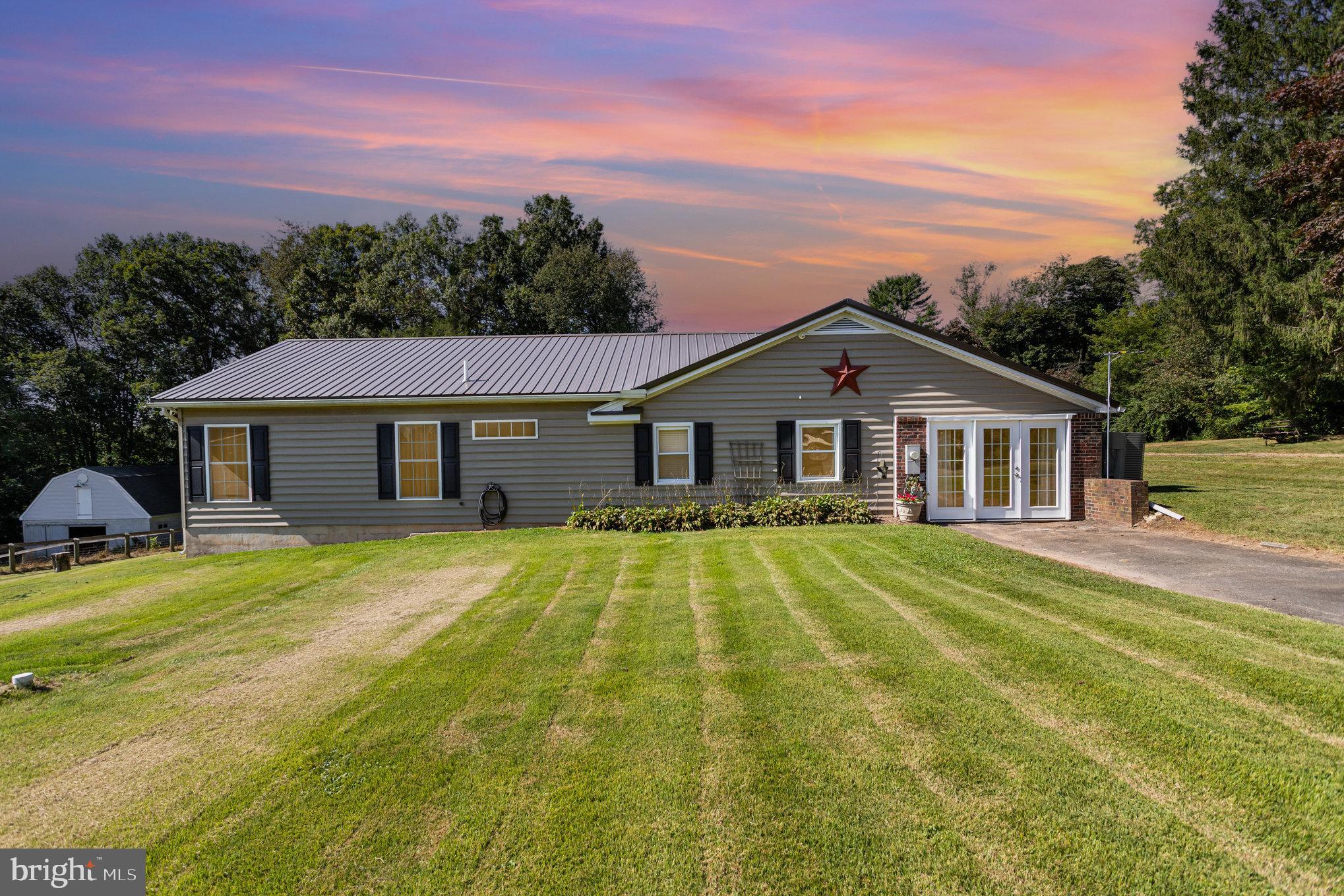 Welcome to this beautifully updated ranch-style home, nestled on a sprawling 2.83-acre lot offering both privacy and space to enjoy. This move-in ready home has undergone extensive updates during the current owner’s tenure, making it the perfect blend of modern comforts and rural serenity.
Inside, you'll find a spacious, open layout that’s been enhanced with updated flooring, a remodeled kitchen, and refreshed bathrooms. The fully updated kitchen boasts modern appliances, sleek countertops, and plenty of storage space. The adjacent laundry room has also been renovated for convenience and ease of use.
The home is equipped with a new HVAC system, ensuring comfort year-round, whether it's warm summer days or chilly winter nights. This home also has an added pellet stove for help take the chill off during those cold winter days. Each room flows effortlessly, offering ample natural light and a welcoming atmosphere.
Step outside, and you'll be amazed by the stunning 2.83-acre lot. A portion of the property is fenced, ideal for keeping animals or creating your own mini pasture. The large barn provides the perfect space for storage, hobbies, or animals, while the oversized 2-car detached garage offers additional parking and storage options.
On hot summer days, take a refreshing dip in the above-ground pool, perfect for relaxing and unwinding. Whether you're looking for a quiet retreat or a place to entertain family and friends, this home has it all.
This property is a true gem—ready for you to move in and start enjoying country living with all the modern updates you’ve been searching for. Schedule your tour today!