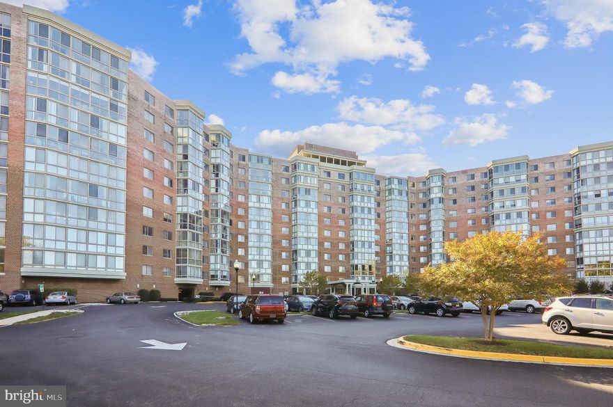 Welcome to luxury living in the sought-after Montgomery County 55+ community of Leisure World! Get ready to enjoy all the amenities that Leisure World has to offer, along with the numerous social activities organized on a weekly basis for the residents of The Overlook. This model is the rarely available, largest unit in The Overlook, featuring 3 bedrooms and 2 1/2 baths, as well as fresh paint and new carpet throughout. The eat-in kitchen provides brand-new stainless steel appliances, abundant storage in floor-to-ceiling cabinetry, and updated granite countertops. Enjoy cozy evenings by the fireplace in the large living area with access to the spacious enclosed balcony/sunroom - the perfect place to relax and enjoy the amazing golf course views.  The bonus 3rd bedroom also makes an ideal office space and has access to the enclosed balcony/sunroom. The primary bedroom suite has an oversized walk-in closet with built-in custom organizer, 2 additional closets, and an en-suite bathroom.  Beautiful marble flooring stretches through the hallway and a separate laundry room is convenient and has plenty of storage.  Covered ground level parking space #146, storage room S-37 and storage cage P-1 cage #8 are all included amenities for this fabulous unit. Great opportunity - don't miss it!