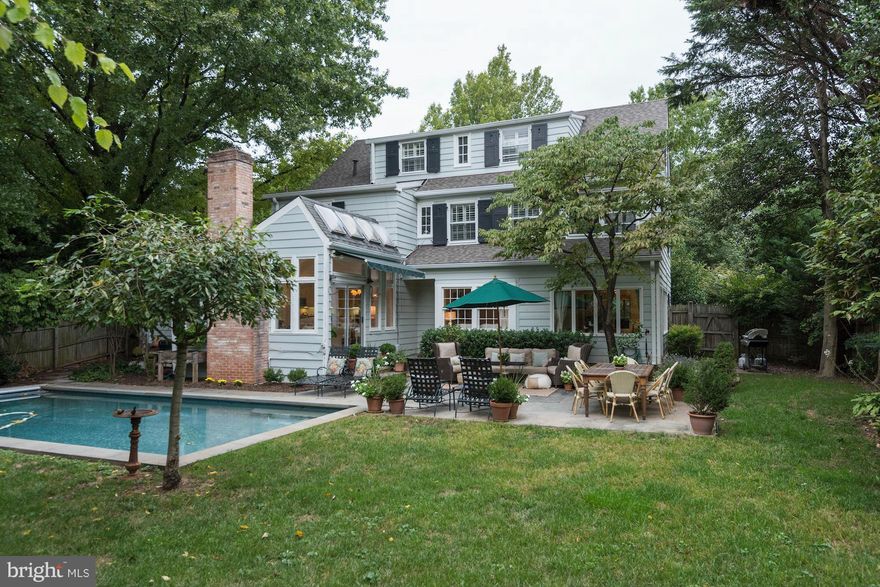 Totally re-imagined for today! Circa 1922 Storybook 5BR on Coveted Block! Features "island-sized" Kitchen open to sunny FR, generous LR w firepl, DR w lush views, cozy Den, lovely Sunroom. Stunning MA BR w WIC, w/d, ensuite gorgeous BA. Finished LL offers versatile space. Expansive  lot w/ expansive Patio & Pool & Garage! New roof & more....Mins to DC & Bethesda..By appt or OPEN 7/8 2-4pm