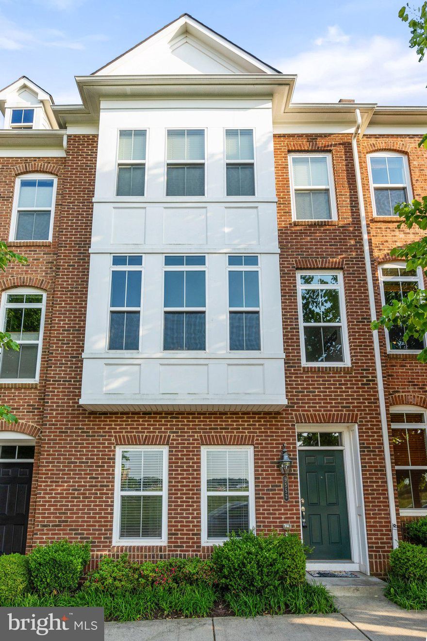 Gorgeous 3-level townhome in desirable MetroWest! Features a bright, open floorplan with over 2300 sq ft. Natural hardwood floors on the main level, a gourmet kitchen with a massive granite island, stainless steel appliances, and tons of cabinet space. Plenty of natural light throughout. Head upstairs to see the spacious primary bedroom suite with an expansive walk-in closet and luxurious attached bathroom.  Two additional bedrooms, a second full bath, and laundry area also located on the upper level. The entry level has an additional bedroom with attached full bath and garage access. Minutes away from the Vienna Metro, excellent and diverse shopping, and a free community center with gym, basketball courts and other great amenities right across the street! Quick access to I-66, Rt 50, and Rt 29 for easy commuting. Don't miss out - your new home is waiting for you!