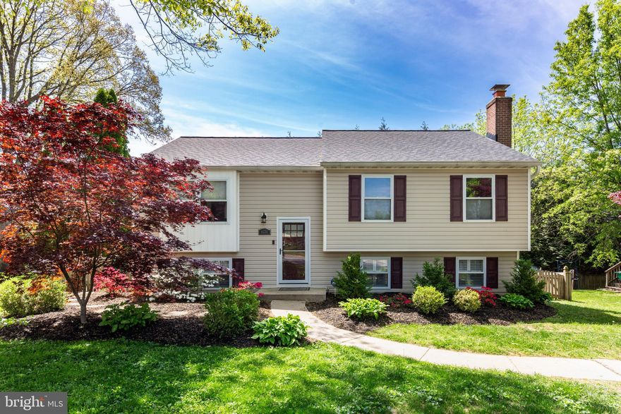 Stunning home situated at the end of a quiet private cul-de-sac in the heart of Eldersburg! This home has been meticulously cared for, including a new roof in 2022, new hot water heater, dishwasher, and refrigerator in 2024, and new washer/dryer in 2020.
From the well manicured front lawn you will enter a very open foyer that takes you to an open concept living/dining/kitchen area.  The hardwood floors are beautiful and add character throughout.  The sliding doors open to a large entertainers deck that overlooks greenery and year round mature evergreens.  The bedrooms are a good size, with a master suite that overlooks the backyard.  Sunlight pours in from the windows, and really brightens up this home!
In the basement there is a very large family room with a fireplace and a TV area.  There is another slider that overlooks the backyard.  The basement has a bedroom with full sized windows and closet storage, as well as a full bathroom that is lovingly updated.