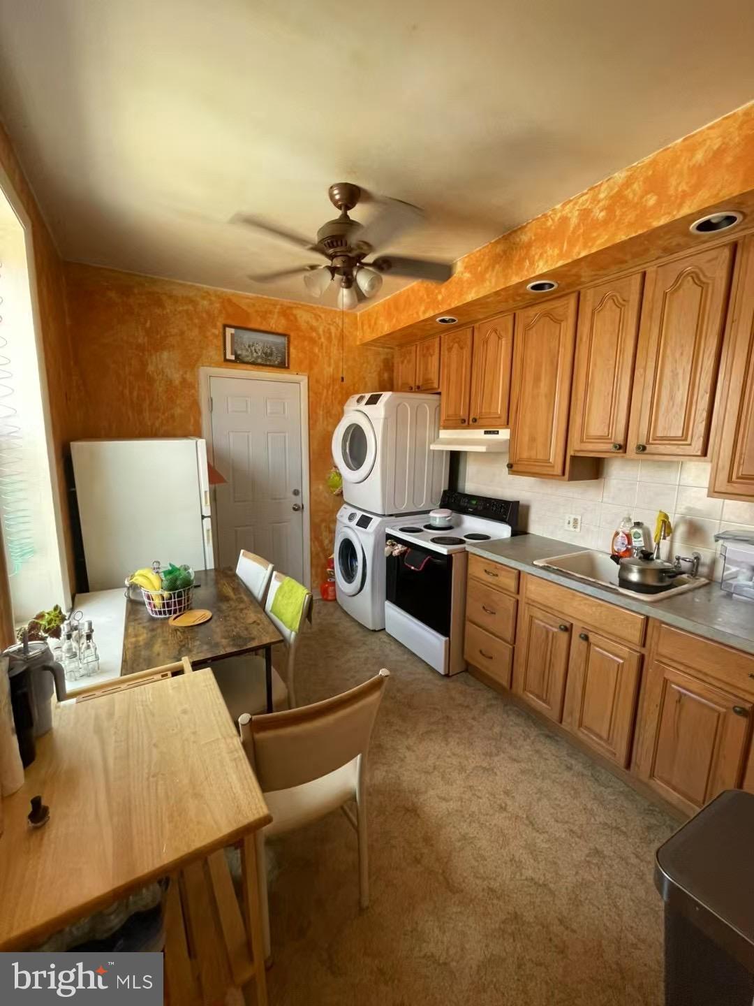 Two residential units with one store front(currently use as an office), first floor front is an office, first floor Rear is one bedroom apartment, second floor is a two bedroom apartment with outdoor patio. Separate electric meters. total monthly rent 2900 which is below market price.