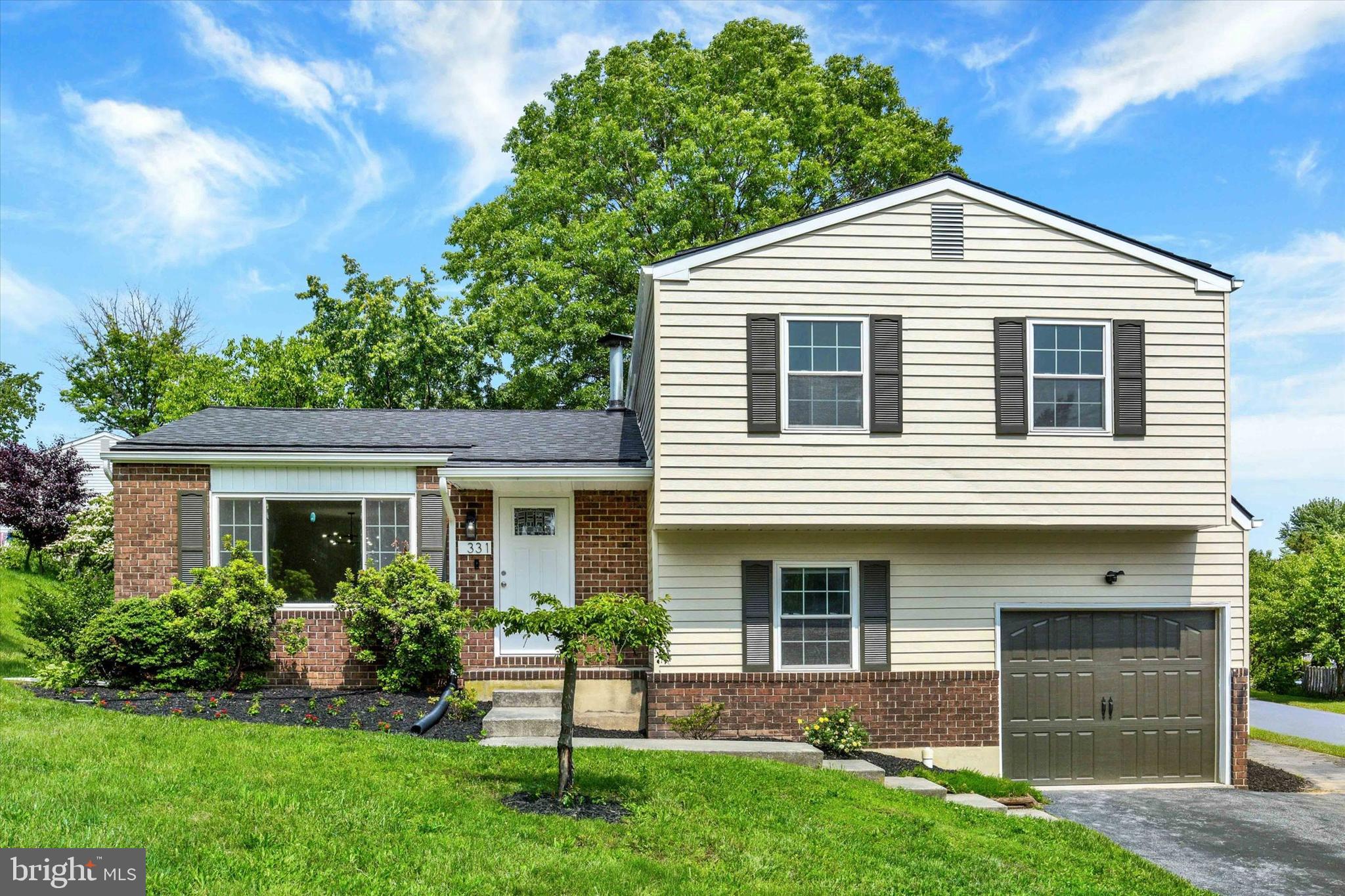 Come see this beautifully updated corner lot home, ideally located just minutes from Central Dauphin and Bishop McDevitt High Schools! This charming 3-bedroom home has been freshly painted both inside and out, and features brand-new LVP flooring throughout. Step into the stunning modern kitchen, complete with all-new cabinets, a sleek quartz countertop, and a full quartz backsplash for a luxurious, contemporary feel. The spacious primary bedroom offers dual closets and a dedicated beauty vanity—a perfect personal retreat. Both bathrooms have been tastefully updated, and there's plenty of living space throughout, including an above-grade lower-level family room and a private office—ideal for remote work or study. Additional highlights include central air, an oversized garage with extra storage space, and a newer roof that’s just 2 years old. This home is truly move-in ready, so don’t wait—schedule your private tour today! Listing Agent has financial interest.