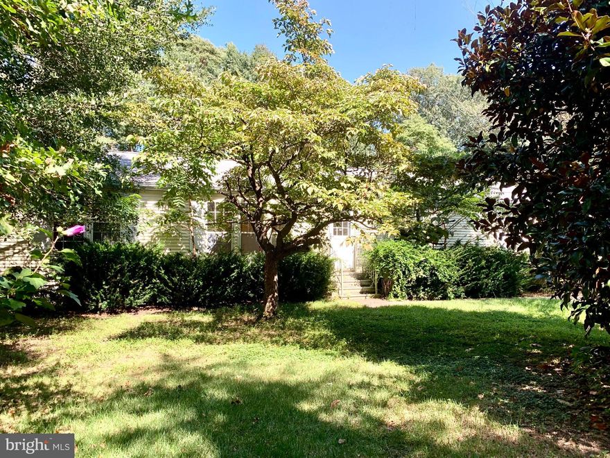 Wonderfully landscaped parcel!  3 bedroom, 2 full bathrooms with a 2-car attached garage on almost a half acre.  Located approximately 20 miles from Rehoboth Beach and approximately 30 miles from Ocean City, MD.  Call to schedule a showing today!