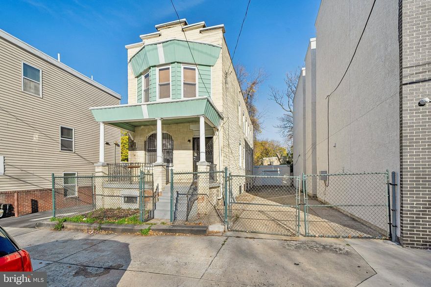 OPPORTUNITY AWAITS!!! Here is a great opportunity to make this large single standing home into a multi unit or utilize the expansive sized lot (32' x 100') to build a new apartment building or keep it as your new home.   Located in West Philadelphia section of Mantua, within walking distance to Drexel University, the Philadelphia Zoo, public transportation, and tons of restaurants, this charming home will provide you with entertainment and convenience. Enter the home through a covered front porch and into an open concept living, dining, and kitchen area. The spacious living room features Laminate floors, windows with plenty of natural lighting, and stairs leading up to the second floor. Passed the living room is the dining area which includes a vaulted ceiling, adding character, charm, and depth. The kitchen is updated and tiled and features beautiful cabinetry, stainless steel appliances, and ample counter space, including a large island. The second floor features four spacious bedrooms and two full bathrooms. Bedrooms include windows and closets for storage. This home includes a large unfinished basement with high ceilings (perfect for finishing), new central HVAC, and a washer and dryer. The quaint backyard features a patio, garage, and driveway with 4-5 parking spots.  The home has been used a rental property for the past several years mainly catering to students.   Rent was $2450/ month.  This home qualifies for the Neighbor First program with Garden State Home Loans offering First time home buyers a $6000 grant and can also be combined with the $10,000 Philly First grant program, totaling $16,000 towards down payment or closing costs.  Enquire for more information.