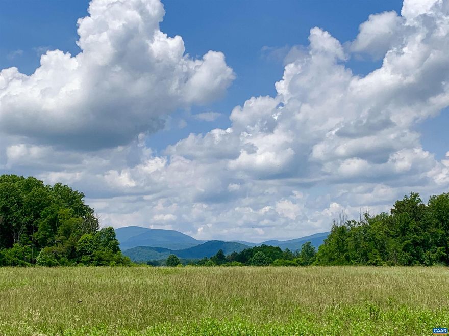 Estate area with no HOA. Ready to build with fifteen GPM well, electric, and septic installed. The owners of this beautiful parcel have invested over $150K in improvements, including a darling shed with a full bathroom. The land is level and entirely open, affording wonderful views in a peaceful and private setting. Less than ten minutes from all major amenities.
