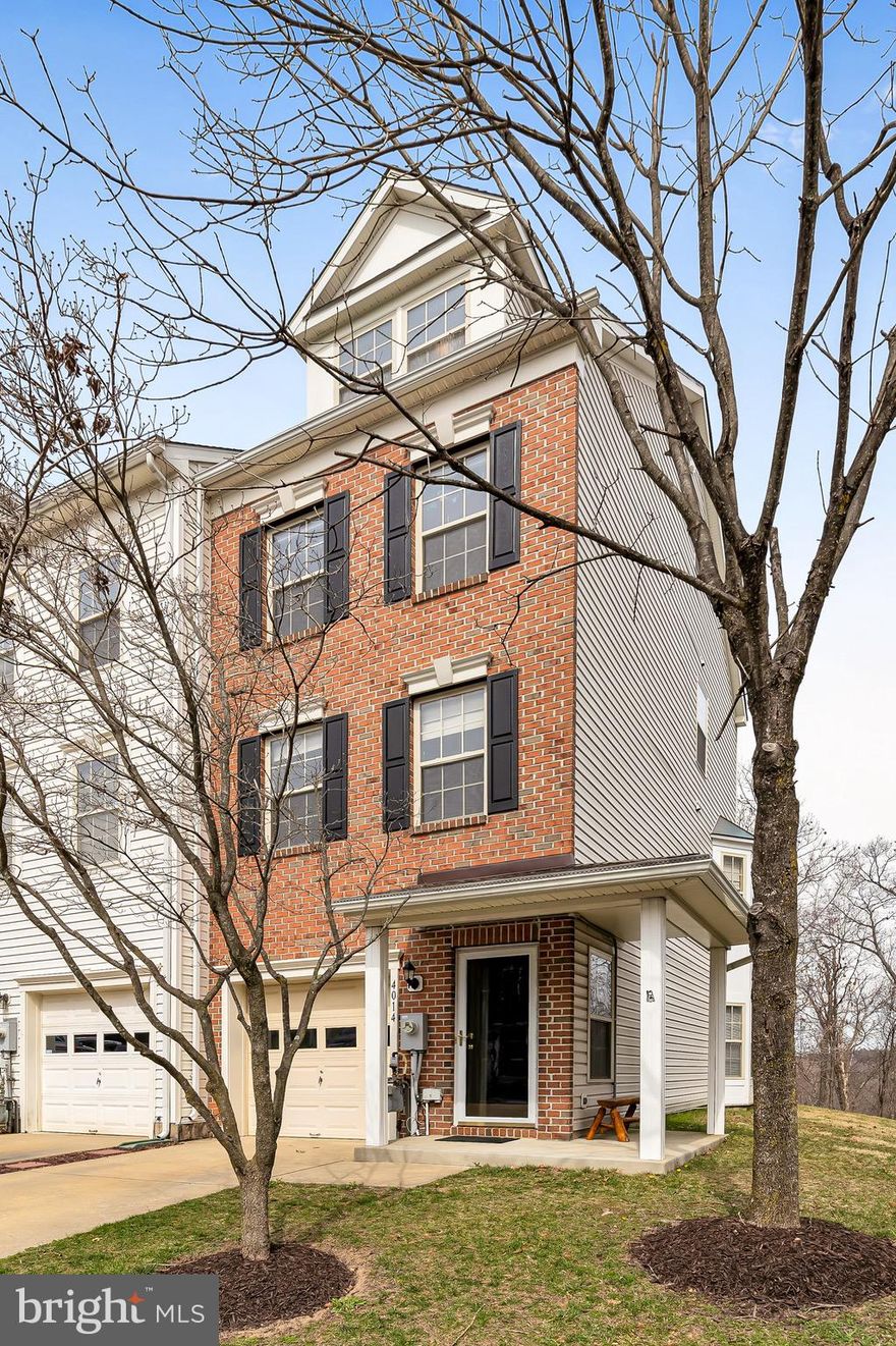 Beautiful end of group home that backs to woods and Red Run Park! Convenient to walking/running trails, only 4 end units back to park location. Recently replaced Gas HVAC and A/C in 2021. Roof replaced in 2019. Access to community pool and tennis court.  Lower level has garage and rec room. Main level includes family room, 1/2 bath, and eat-in kitchen with granite counters, stainless appliances, and 42-inch cabinets. Upper level with 2 bedrooms, 1 bath, and laundry room. Second upper level comes with primary bedroom ensuite with full bath and whirlpool tub.  Plenty of space to stretch out in this home!