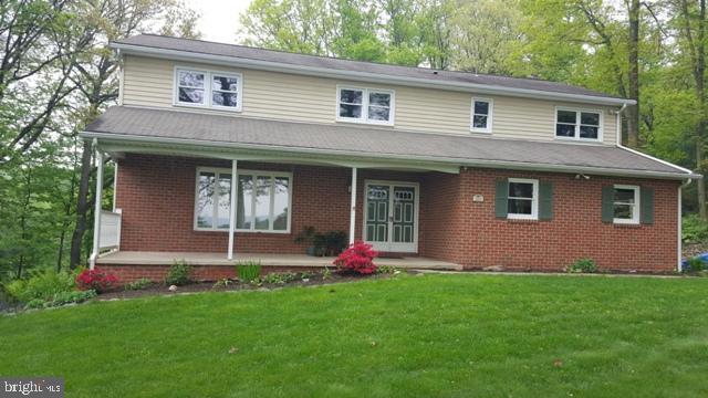 Great home located in the country hills of York county. Beautiful secluded 1 acre lot with beautiful gardens and landscape. Newly renovated kitchen with granite counter tops open to large family room with full wall brick fireplace with wood/coal insert, built in and French doors to rear patio. Dining room with hardwood flr and built in corner cabinet, 1st Flr laundry, sunken living room, bamboo hardwood in master and 2 other bedrooms.
