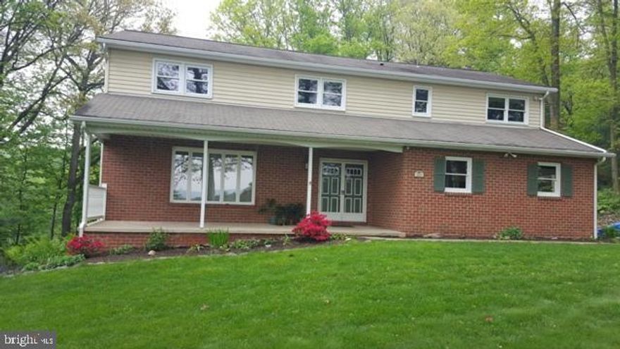 Great home located in the country hills of York county.  Beautiful secluded 1 acre lot with beautiful gardens and landscape.  Newly renovated kitchen with granite counter tops open to large family room with full wall brick fireplace with wood/coal insert, built in and French doors to rear patio. Dining room with hardwood flr and built in corner cabinet, 1st Flr laundry, sunken living room, bamboo hardwood in master and 2 other bedrooms.