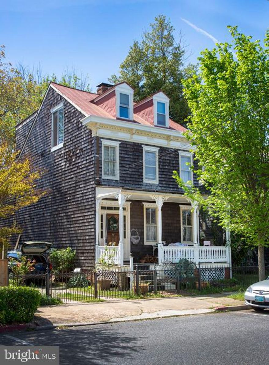 In The Heart Of Eastport!  An exceptional dream home site waiting for you on a beautiful 9.250 sf lot.  A lot this size  is rarely found on the Peninsula.   This extraordinary home built in the late 1800's to early 1900's was one of several homes built by a local Captain and Chesapeake Bay family who made their living fishing from our beloved bay.  Renovated in 1984 by the current owner this home is open and airy. One of the many wonderful features and focal points of this home is a floor to ceiling double sided brick fireplace completely rebuilt on the main living level with over 9 foot high ceilings and the entire first floor was opened to one large room separated only by the grand chimney.  The original heart of pine floors were taken up throughout the home and restored as well as the staircase spindles and all of the original custom features.  The four bedrooms and 2.5 baths and large lot with plenty of room to expand provide the perfect setting for entertaining with a convenient location to restaurants, easy access to boating, museums Yacht Clubs and shopping.  The bones of this home are terrific all that is required is TLC.  You're not just purchasing a home a home, you're purchasing a piece of maritime history and a lifestyle. Showing are limited to Saturday by appointment only from 12 to 1:30 please call Kurt Hornig to schedule a showing at 410-353-0752