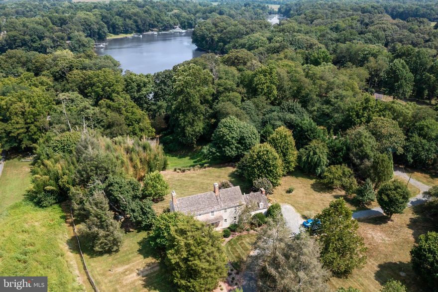 Step back in time with this exquisite waterfront property, a rare gem dating back to the 1700's with wide plank floors and classic fireplaces throughout., nestled on almost 11 acres of land that provide ample outdoor space for gardening, recreational activities with mature trees and direct access to Swantown cove and the Sassafras river. This remarkable estate seamlessly blends historic elegance with modern comforts, offering a serene retreat for those seeking tranquility by the waters edge. Conveniently located near waterfront, marinas, restaurants and bars, and close to access points north and south including 301- Middletown DE for more restaurants and all your shopping needs.