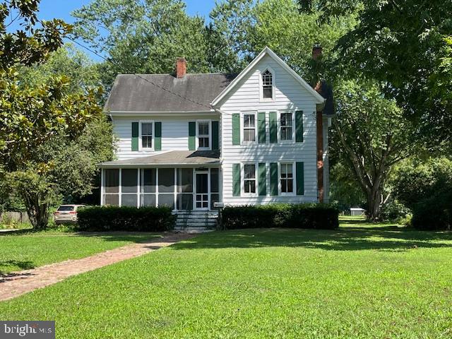 If you want to be walking distance to downtown Berlin and enjoy a historical home this is the place for you. Step off of Main Street on the brick walkway to enter the home. One acre of land contains a 3 bedroom, 2 1/2 bathroom home. Upgraded heat and air with mini-splits and blown in insulation in the walls. Plenty of room with a large kitchen with many cabinets, dining room with a pantry, living room has a wood burning fireplace, family room, laundry room, one bathroom and a remodeled half bath on the first floor. 9' ceilings on the first floor. The second floor has three bedrooms, an office and a full bathroom. A walk up attic has plenty of space for all those extras. A partial basement is included. Outside is an 8 X 20 shed for all your equipment. This is being sold "as is".