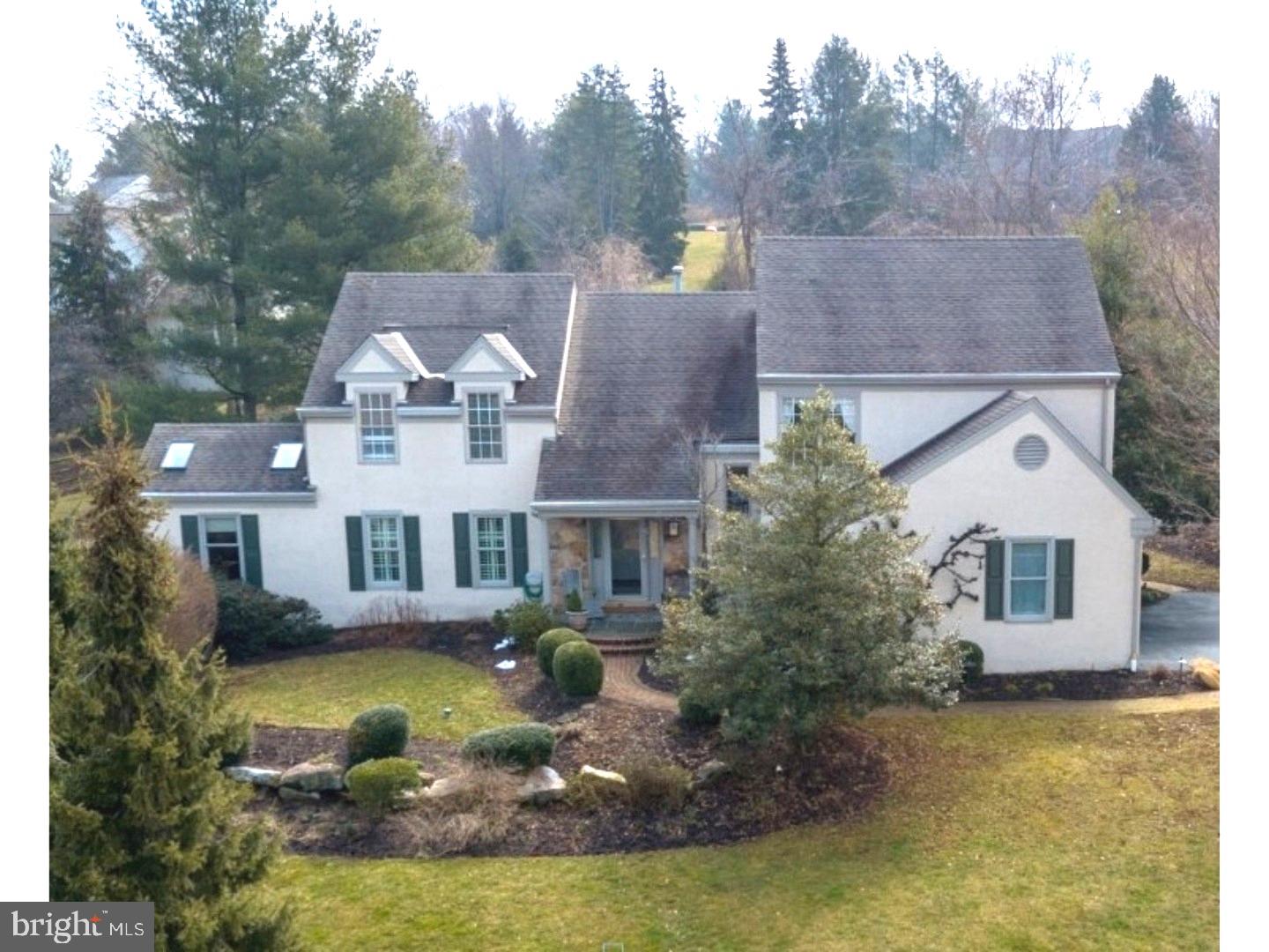Welcome home to this spacious, move-in condition, 2 story colonial with a picturesque view of Marsh Creek Lake and just a short stroll to all the fishing and boating activities the area has to offer. Rarely do you find a home that is so close to beautiful Marsh Creek State Park with all its walking trails and amenities. Nestled on a beautifully landscaped secluded lot with a fenced rear yard, this spacious home is equipped with many upgrades for modern living. Enter into the vaulted ceiling foyer and feel the open expanse of the first floor.  Crown molding and hardwood floors enhance the living room, dining room and great room. An additional room off the living room features multiple skylights and provides space for a sunny home office. The updated eat-in kitchen includes maple cabinets, Corian counter tops, gas cook top, and a garden window for your winter herbs. The kitchen opens to a vaulted ceiling great room with a lovely winter warming gas fireplace. Sliding doors from both the kitchen and formal dining room lead out to the expansive flagstone patio, with retractable awning and hot tub. The vegetable garden is waiting to deliver its summer bounty and the perennial gardens their gorgeous summer blooms. A powder room and large laundry room with outside access complete the first floor. The expanded upper floor offers another office/ sitting room with built-in cabinetry and flows into the spacious master bedroom. The newly renovated master bath (2017) features glass shower doors and glass tile accents. Three additional well sized bedrooms and a hall bath with double sinks complete the second floor.  A finished basement with built-in TV wall unit offers additional space for relaxing. To top it all off, this home has recently installed heating, air-conditioning and hot water units. Come see this incredibly well maintained home that has been upgraded continually throughout the years.  Great Downingtown schools with highly recognized STEM program, and close to the PA turnpike - suburban living at its best.