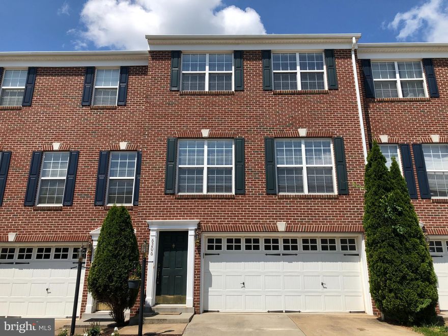 Stunning 3-level townhome with gorgeous wood floors.  Eat-in gourmet kitchen, breakfast area.  Separate dining room with tray ceiling.  Large living room.  Upstairs master suite with vaulted ceiling, and spacious luxury bath.  Lower level with bump-out, and wood floors, huge family room with gas fireplace. Walk down the street to the swimming pool.  Ready immediately! Month to Month lease extension possible after first year. Nice deck and lower level patio.