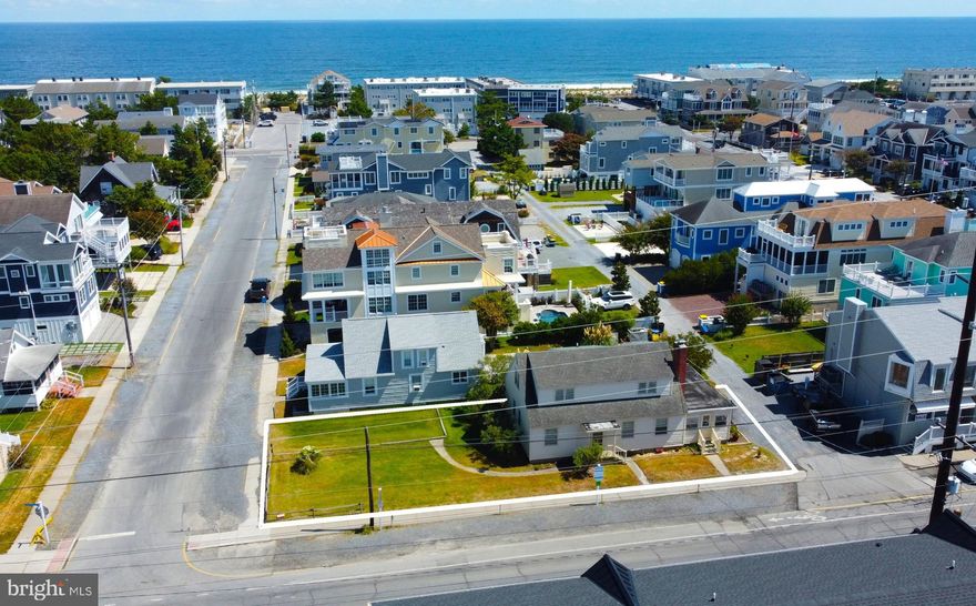 Situated on a 50’ x 125’ parcel on the first beach block in downtown Bethany, this classic coastal cottage is brimming with potential. Positioned adjacent to the Loop Canal and just over a block to the ocean, it’s an easy stroll to the beach, boardwalk, and the vibrant parkway filled with shops and restaurants. The enclosed porch is filled with natural light, while the spacious floor plan features a combined kitchen and dining area, a separate living room, and 2 bedrooms and 1.5 baths on both levels. This home offers the perfect canvas to update at your own pace or create your custom dream retreat, just steps from the ocean.  With ample room to design a pool and outdoor living spaces, the opportunities are endless in this prime Bethany Beach setting.