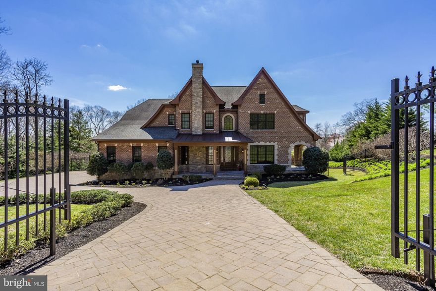 Welcome Home to Great Falls! Custom built in 2010 with impeccable details, this private oasis is ready and waiting for you! Over 250k was added to the exterior in 2015. Custom heated swimming pool with automatic cover, water jet and hot tub. Extensive hardscape including a built in grill and brick oven, landscaping with custom lighting, automatic iron entrance gates, fully fenced yard plus a sprinkler system. Inside you will find soaring 12ft ceilings, custom stone work and solid wood detailing throughout. Expansive kitchen with high quality cabinets and top of the line appliances. Two large islands and built-in wine storage. Gorgeous wood beams on the ceilings plus ample natural light in the morning room. Cozy up to multiple gas fireplaces, or spend time in your two built in libraries. Sip your morning coffee off the master bedroom deck or spend the afternoon lounging by the pool. Each bedroom is generous sized and offer custom walk-in closets. New washer & dryer upstairs. The fully finished basement offers a wet bar, media room and large second master bedroom, perfect for guests or Au Pair. Bonus features include a private media room, 6 zone speakers, high tech fiber optic service, server room, large capacity Kohler gas generator, central vacuum, security cameras, radon mitigation system installed. Extra storage in the 3 car garage! Near Route 7, Silver Line Metro, Shops in Reston and Tysons Corner. Convenient to Dulles Airport.