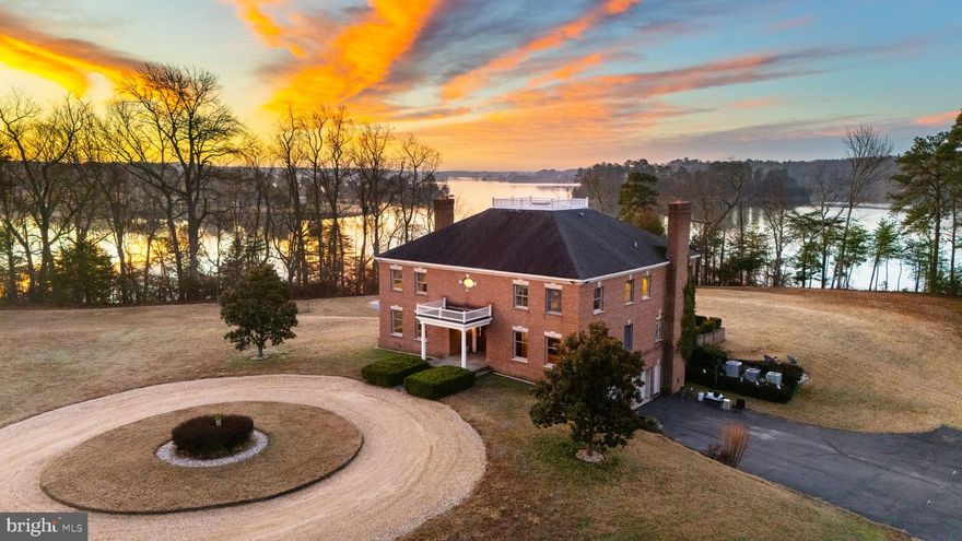 Welcome to The Retreat at Hattons Rest!

A truly exceptional private waterfront estate set on a secluded 5.26-acre peninsula with an impressive 1,100 feet of pristine shoreline along the historic St. Mary's River.

This magnificent 7,376-square-foot custom all-brick colonial home offers stunning water views from the kitchen and family room, where expansive windows perfectly capture the river's beauty and abundant wildlife, including soaring bald eagles, ospreys, great blue herons, wild turkeys, and roaming deer.
Launch your boat year-round from your private 100-foot pier and fish for rockfish, flounder, bluefish, perch, and crabs right from your backyard—or take a quick 20-minute cruise to the Potomac and Chesapeake Bay for trophy-sized Cobia, Drum, and citation rockfish.

Step inside to a grand foyer featuring a custom staircase that opens to sweeping rear river vistas. The main level offers a convenient bedroom and full bath, ideal for guests or multi-generational living. The primary suite and kitchen bask in morning sunlight, while the family room glows with sunsets. A covered second-floor porch and large rear masonry deck extend the outdoor living space, providing even more breathtaking views from the family room, kitchen, and select bedrooms.

Relax in the low-maintenance 20x30 Sylvan pool from spring through fall, then unwind by the wood-burning fireplace in the spacious family room or the gas fireplace in the primary bedroom when the weather turns cooler.

Additional features include cleared, level land perfect for horses or a small farm, remarkable privacy, and easy access to Patuxent River Naval Air Station (only 4 miles away), excellent public and private schools, St. Mary's College, shopping, dining, and nearby marinas.

More than just a residence, this property is a peaceful waterfront haven—an ideal family compound or enduring legacy retreat.