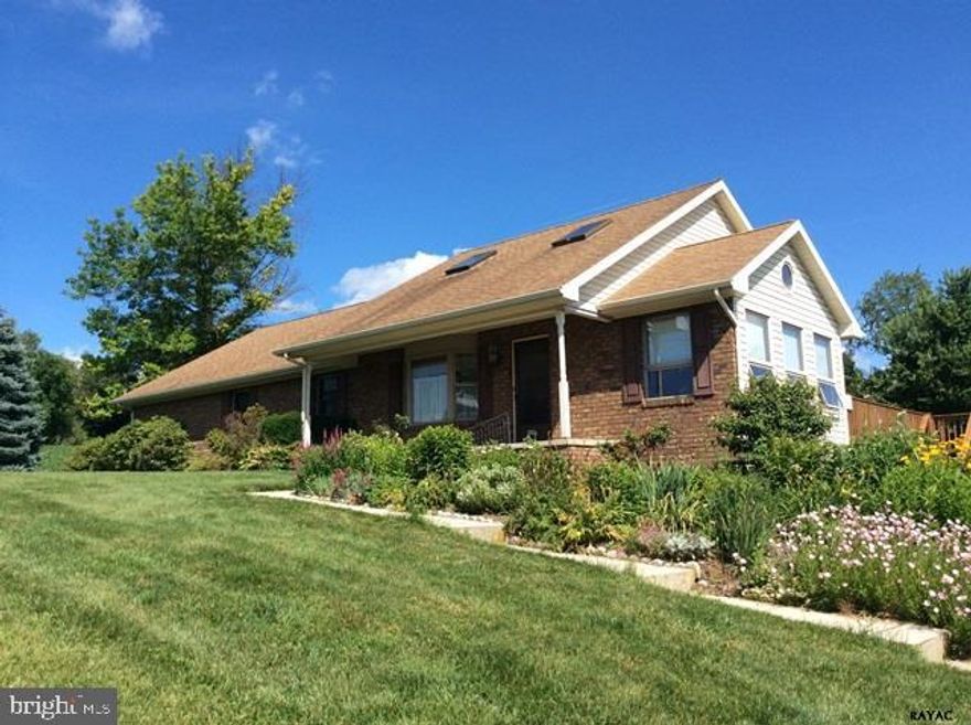Lovely rancher on scenic, rural 1 acre lot close to Maryland line! Open floor plan on upper level has custom kitchen, french doors leading to a sun room and wrap-around deck. This home boasts large rooms, wood floors, 2 fireplaces, brick covered patio, many walk-in closets & so much more. See Assoc Docs for list of all home's highlights! New water heater, July'14