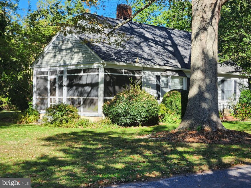 Nestled in the charming Oxford Road neighborhood, this exquisite Cape Cod residence offers a harmonious blend of classic elegance and modern comfort. Built in 1951, this home has been lovingly maintained, showcasing its timeless architectural style while providing all the conveniences of contemporary living. As you step inside, you are greeted by a warm and inviting atmosphere, highlighted by a cozy fireplace that serves as the heart of the living space. The open layout seamlessly connects the living room to the dining area, creating an ideal setting for both intimate gatherings and lively entertaining. Natural light pours in through thoughtfully placed windows, enhancing the home's welcoming ambiance. The kitchen, though compact, is designed for functionality and charm, featuring modern appliances that cater to your culinary adventures. This residence boasts two generously sized bedrooms, each offering a peaceful retreat at the end of the day. The primary suite is a sanctuary of comfort, perfect for unwinding after a long day. The home includes one full bathroom and a convenient half bath, ensuring that every need is met with ease. Set on a spacious 0.38-acre lot, the outdoor space is a canvas for your imagination. Whether you envision a lush garden, a serene patio for morning coffee, or a vibrant space for outdoor gatherings, the possibilities are endless. The detached garage provides ample storage and parking, adding to the home's practicality. The location is equally enticing, offering a tranquil suburban lifestyle while remaining conveniently close to local amenities, parks, and recreational opportunities. Enjoy leisurely strolls through the neighborhood or take advantage of nearby shopping and dining options. This property is not just a house; it's a place to create lasting memories and embrace a lifestyle of comfort and elegance. Experience the charm of Oxford Road and make this delightful Cape Cod your new home.