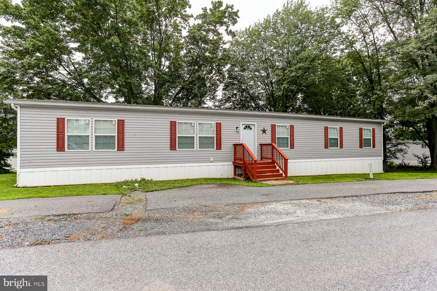 Welcome to your dream home in one of the most desirable parks in the area! This stunning manufactured home offers a perfect blend of comfort, convenience, and modern living. As you step inside, you'll immediately be drawn to the spacious and beautifully designed kitchen. With abundant counter space, high-end appliances, and plenty of storage, this kitchen is a culinary enthusiast's delight. The primary bedroom is a true sanctuary, featuring a generous walk-in closet to accommodate all your wardrobe needs. The attached bathroom adds an extra touch of luxury, providing a private oasis where you can relax and unwind after a long day. Carpet is less than a year old.  Enjoy the convenience of an easy commute to Harrisburg and Lancaster.