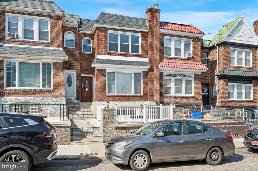 A beautifully renovated townhome nestled in the desirable West Oak Lane neighborhood of Philadelphia. Welcome to 1811 Ashley Street. This move-in ready home offers the perfect blend of modern finishes, functional living space, and everyday convenience with 3 bedrooms, 2 full bathrooms, a fully finished basement, and attached garage for off street parking. Step inside to an inviting open-concept main level featuring rich hardwood flooring and striking modern color palette. The expansive living and dining area flows seamlessly into the beautifully updated kitchen, complete with stainless steel appliances, a center island with additional seating and prep space, sleek two-tone cabinetry, and a stunning blue-toned mosaic backsplash that adds the perfect pop of color and designer touch to the space. Upstairs, all three bedrooms offer plush carpeting, ceiling fans, and ample closet space. The updated hall bathroom features a modern vanity and tub/shower combination with clean contemporary finishes. The fully finished basement provides valuable additional living space ideal for a second family room, home office, gym, playroom, or guest setup. A second full bathroom is conveniently located on the lower level, along with direct access to the attached rear garage providing sought-after off-street parking. Located in the heart of West Oak Lane, this home is just moments from Broad Street, public transportation, shopping, dining, parks, and major commuter routes. Known for its tree-lined streets, classic Philadelphia charm, and strong sense of community, West Oak Lane remains one of the city’s most established and conveniently located neighborhoods.