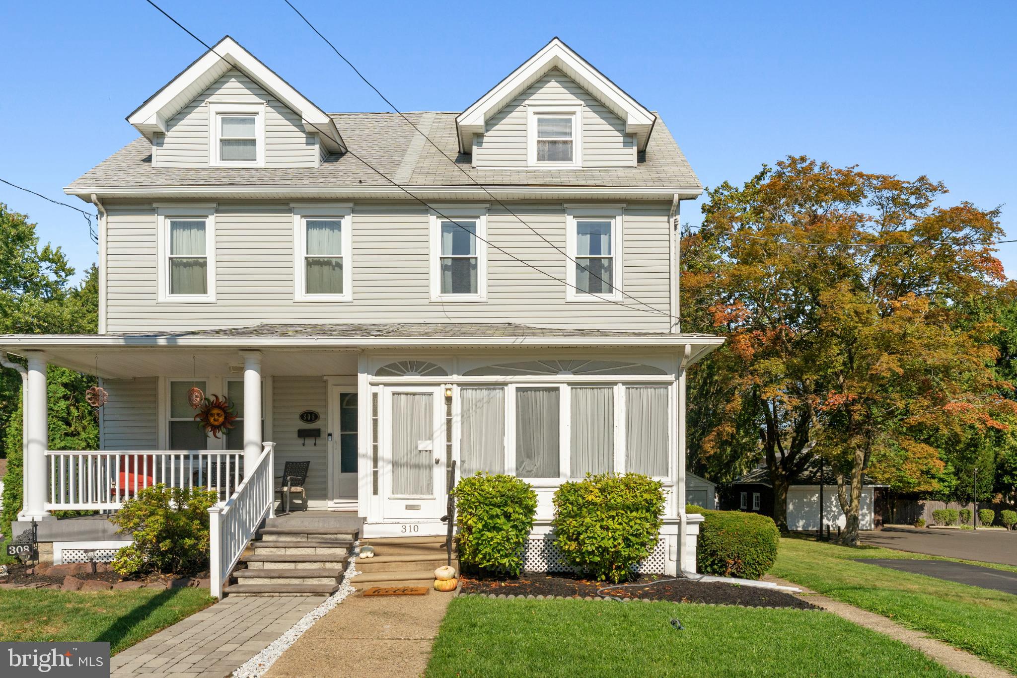 Step into this charming Colonial twin home, a perfect blend of classic historical elegance and modern convenience. With 1,576 sq. ft. of well-designed space, this residence features four spacious bedrooms and 1.5 baths, with a bright and airy entryway 3 season room ideal for both relaxation and entertaining. The gourmet kitchen, equipped with stainless steel appliances, a built-in microwave, maple cabinetry, granite counter tops, gas cooking, and a cozy table space invites culinary creativity. Enjoy the warmth of gorgeous hardwood floors and the comfort of carpeted areas throughout. The unfinished basement offers potential for customization, while the main floor laundry adds practicality to your daily routine. This home has recently been re-energized with Fresh Paint, new carpets, new light fixtures and ceiling fans! Step outside to a delightful deck, perfect for summer gatherings or quiet evenings under the stars. Located in a vibrant neighborhood, you'll find local parks, shops, and dining options just moments away. With a detached garage and driveway parking, convenience is at your fingertips. This home is not just a place to live; it's a lifestyle waiting to be embraced!