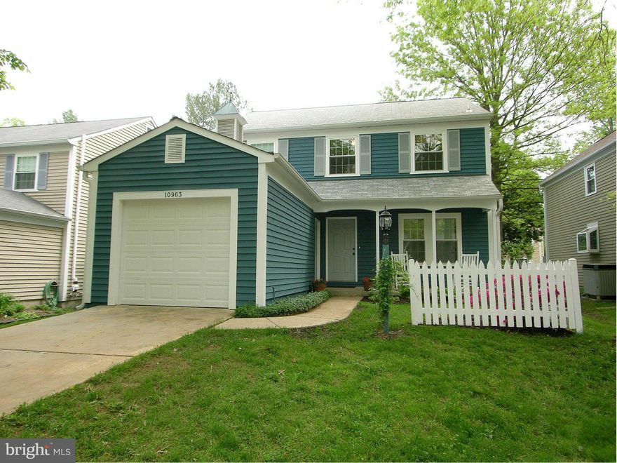 New Price! Look! Absolutely Pristine-Top To Bottom!Just Painted Inside+Out.All New Carpet.Baths Just Renovated.Gorgeous Hardwood Flrs.Custom Kitchen Design Featuring Solid Cherry Cabinets+Built-In Desk.Storage/Closet Shelving Systems.FP Rough-In.Updated Fixtures.Open Flowing Flrplan+Extra Spacious Rm Sizes.Inviting Front Porch.Rear Deck.Fenced Yard.++So Convenient To Major Roads+Downtown Columbia!