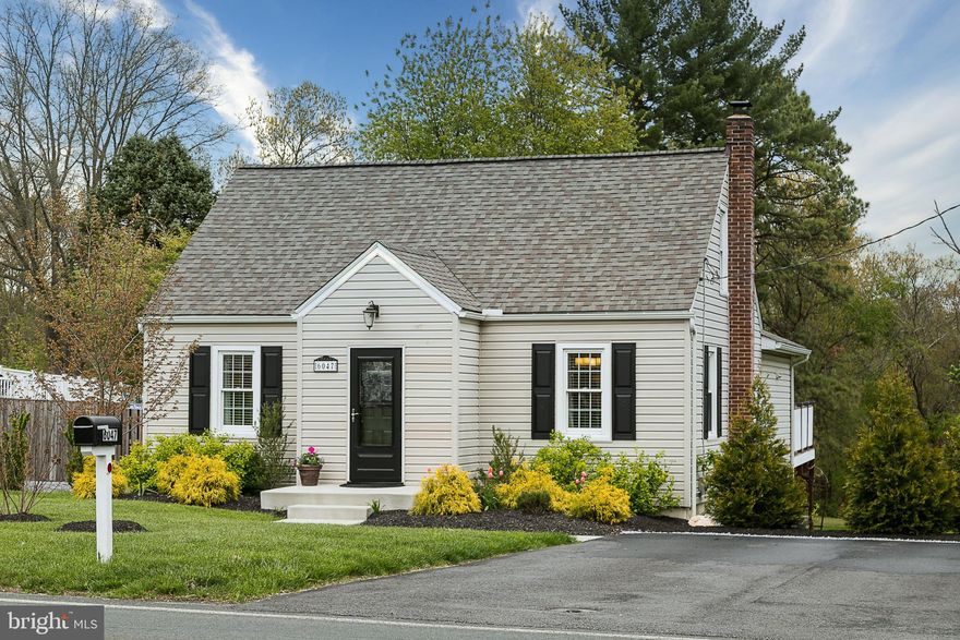 This charming  4 bedroom & 3 full bath cape cod has been renovated from top to bottom and looks like it came straight from a magazine.  Don't let the front picture fool you! With over 2,500 square feet you will have plenty of room inside. As you enter the first floor you will see it features crown molding, and hardwood flooring,  a stunning living room and separate dining room. The master suite with walk-in closet and private bath. A second bedroom and bath on your main living level as well.  The kitchen has SS appliances, beautiful white cabinets, back splash, custom lighting and  large  island.  The back door give you access to your spacious deck which will be perfect for relaxing on those summer nights.  The lovely dinette off the kitchen with it's built-ins finish off this first floor. The second floor has a full bedroom and cozy loft area perfect for relaxing.  The  basement area has a  laundry room,  guest bedroom and bath and second living room. Step outside  to your lower level patio which looks out to your large yard. Updated  roof with a 50 year warranty, new HVAC and backup oil heat system. No details have been missed!  Showings by appointments only.
