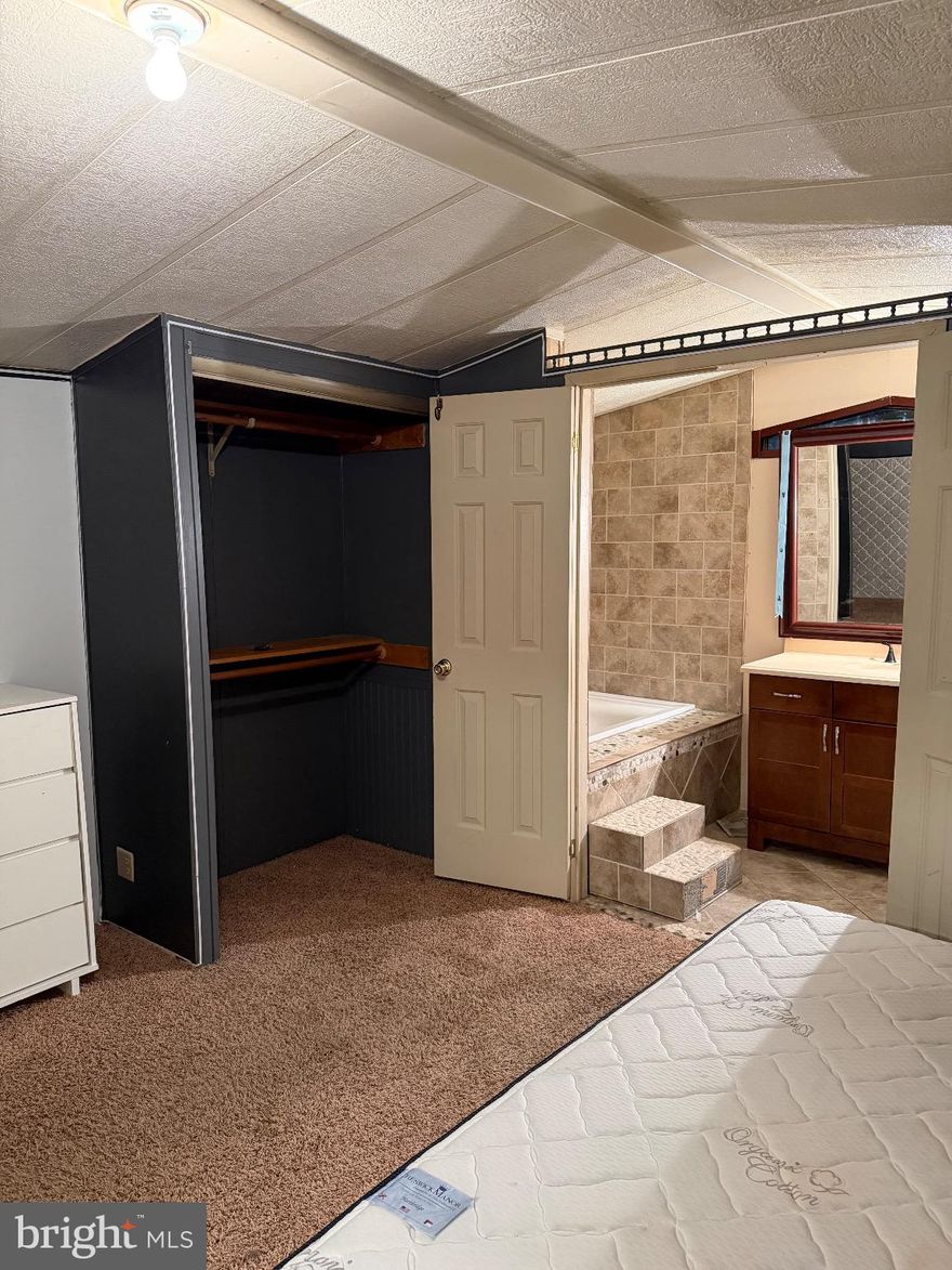 Discover a prime investment opportunity in the sought-after VAN BIBBER subdivision. This well-maintained manufactured home, built in 1988, offers a solid foundation for generating rental income or enhancing your real estate portfolio. With 2 spacious bedrooms and 2 full bathrooms, this property is designed for comfort and functionality, making it an attractive option for potential tenants. The home features a unique architectural style that stands out in the neighborhood, constructed with durable frame and glass materials. The layout maximizes space, providing an inviting atmosphere that can easily be tailored to suit various tenant preferences. The absence of a pool simplifies maintenance, allowing for lower operational costs, while the driveway and on-street parking options enhance accessibility for residents and guests alike. Investors will appreciate the potential for steady cash flow in this area, known for its stable rental market. The property's design and location make it ideal for long-term rentals, appealing to a wide range of tenants seeking quality housing. With no homeowners association fees to contend with, your investment remains cost-effective, maximizing your return on investment. The property is situated in a community that values convenience and accessibility, with essential amenities and services just a short drive away. This strategic location not only enhances tenant satisfaction but also contributes to the property's long-term value appreciation. Whether you are a seasoned investor or looking to enter the real estate market, this property presents a compelling opportunity. With its solid structure, functional layout, and favorable market conditions, you can expect a reliable income stream and potential for future growth. Don't miss out on the chance to add this valuable asset to your portfolio. Schedule a viewing today and explore the possibilities that await! Sellers selling as is.