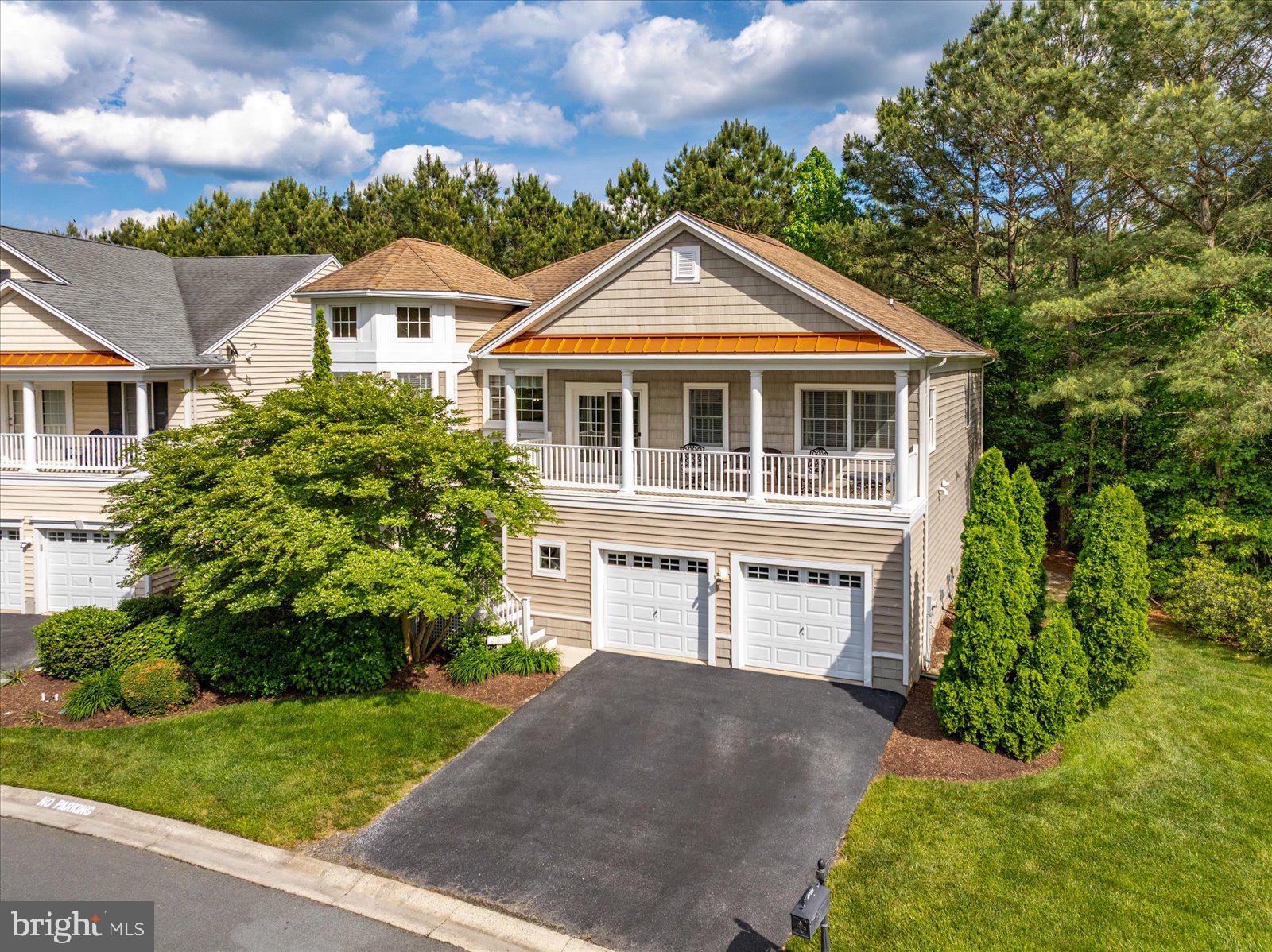 Located in the sought-after community of The Landings at Bayside, 8705 Habitat Court in Berlin, MD is a beautifully maintained 5-bedroom, 3.5-bath coastal home nestled on a quiet cul-de-sac. The spacious main level welcomes you with updated ceramic tile flooring and a thoughtfully designed layout ideal for both entertaining and everyday living. The gourmet kitchen features stainless steel appliances, a gas cooktop, double oven, and a custom tile backsplash above the stove, creating a distinctive focal point. The kitchen flows effortlessly into the eat-in breakfast area, formal dining room, and a cozy living room with a fireplace.
The main-level primary suite is a serene retreat complete with a vaulted tray ceiling, a walk-in closet with custom cabinetry, and a spa-inspired bath featuring a soaking tub, separate shower, and double vanity, offering the perfect combination of luxury and functionality. Also on the main level are a guest half bath and a dedicated office, which opens to a large deck, ideal for enjoying sunsets. The lower level expands the home’s functionality with a second primary suite, three additional bedrooms, two full bathrooms, a second living area, and a generously sized laundry room. You'll find ample storage throughout the home, including an oversized garage with a storage area, ideal for all your coastal gear and hobbies. Outside, a generous side yard with untapped potential for space to relax, garden, or entertain. This home has low HOA fees and taxes, making it a perfect primary residence, second home, or investment property—especially with short-term rentals permitted. The Landings at Bayside is a resort-style community offering exceptional amenities, including a clubhouse with heated indoor and outdoor pools, a fitness center, game room, tennis and basketball courts, nature trails, a crabbing pier, a stocked fishing pond, and a kayak launch. Enjoy panoramic bay views from two community docks and convenient access to Ocean City beaches, Assateague Island, and historic downtown Berlin. With lawn care and trash service included, this home provides a low-maintenance lifestyle in a vibrant coastal setting. The home is being sold unfurnished, but the seller is open to selling furniture separately. The property is being sold As-Is, and the seller is offering a $5,000 buyer credit at closing with an acceptable offer.