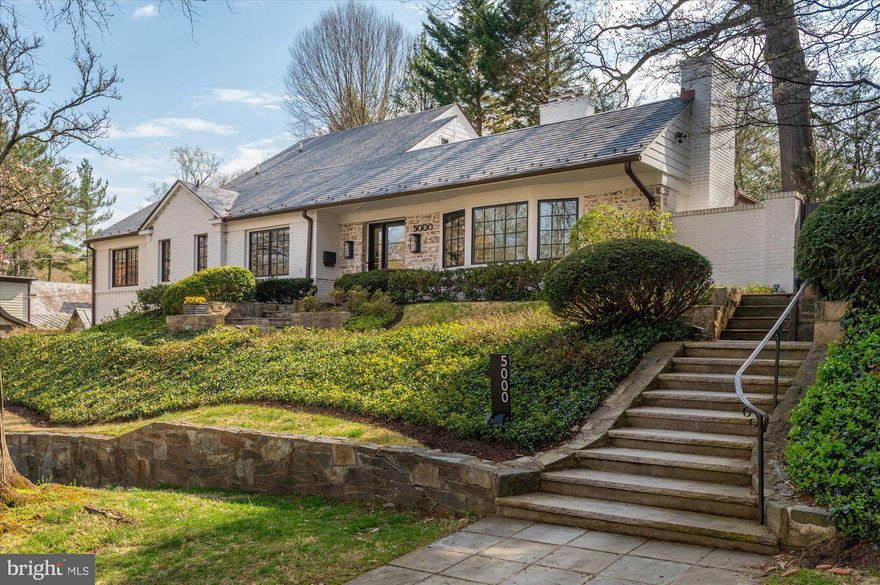 OH's cancelled; ratified contract.

This is a special house, ideally positioned on one of the most desirable blocks in Spring Valley. 

Overlook is a wide, tree‑lined street with limited through‑traffic, offering a peaceful setting and wonderful curb appeal. The home sits at one of the higher points on the street, enhancing both privacy and natural light.

Renovated in 2020–2021 by Third Street Architecture, the house shines with abundant light, thoughtful design, and a terrific floor plan. It is approximately 4,183sf (public record)/3,400sf (floor plan), with five bedrooms and four full baths across three levels.

During the renovation, the foyer was widened and its ceiling was newly vaulted, creating an impressive entry. The kitchen was opened to the dining room and family room, and the ceiling in the dining/family room — already vaulted — was integrated into the new design. Wood floors were added in the kitchen and dining rooms. The result is an ideal blend of everyday comfort and excellent entertaining flow. Doors from the kitchen to the terrace and between the family room and living room allow for seamless indoor/outdoor living.

The main level offers two distinct living spaces: a family room and a living room, the latter featuring one of the home’s three fireplaces. The living room also includes walnut built‑in bookshelves. The kitchen features quartz countertops, a custom wood cap detail, an island that seats four, and stainless steel appliances—all updated since purchase. The dining room includes a fireplace, skylights, and additional built‑in storage.

The bedroom wing on this level includes the serene primary suite with two walk‑in closets, an additional closet, and an oversized bath with a soaking tub, separate shower, water closet, generous storage, and ample vanity space. A second bedroom, hall bath, linen closet, and two front hall closets complete this level.

The second floor offers two additional bedrooms with leafy, private views, a full hall bath, and substantial attic storage.

The lower level was completely rebuilt during the renovation and now includes a gym, a fifth bedroom/bath suite, a family room, and a laundry room.

The home features a large two‑car garage with extra storage space, built‑in cabinets, a workbench, an additional refrigerator, and room for numerous bicycles. A new, well‑insulated garage door and motor were installed during the renovation. The driveway provides ample off‑street parking.

The roof is primarily new slate (2024), and all windows and exterior doors were replaced with Sierra Pacific / Andersen products. Additional upgrades include a sprinkler/irrigation system, encapsulated crawl space, and refinished dark oak floors throughout, which are in excellent condition. Earlier improvements (2013) include new siding, gutters, skylights, and the lower‑level bathroom.

Outdoor spaces offer multiple areas to relax, dine, or entertain, with a gas grill conveniently located just outside the kitchen.

Walk to Millie’s, Pizzeria Paradiso, Starbucks, Compass Coffee, and more.