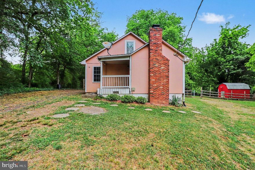 Tucked away on 1.374 peaceful acres, this charming older home offers a rare opportunity to create your dream retreat while enjoying the beauty of nature all around you. The property is graced with gorgeous mature shade trees, including a stunning magnolia that serves as a true centerpiece, along with young fruit trees ready to flourish for years to come. While the home is ready for your personal updates and vision, several major improvements have already been taken care of, including a newer roof, double-pane vinyl windows, and an updated HVAC system—providing comfort and peace of mind. Finished attic for additional room or storage.  The fenced backyard offers space for pets, gardening, or outdoor entertaining, and two storage sheds add extra convenience and flexibility. Surrounded by privacy and tranquility, you’ll feel miles away from it all—yet you’re just minutes from the heart of Fredericksburg. Located just about 3 miles from downtown, you’ll enjoy the easy access to shopping, restaurants, major highways, and the Virginia Railway Express (VRE), making commuting simple and convenient. Whether you're looking to renovate, invest, or settle into a serene setting close to everything, this property offers endless potential in an unbeatable location.