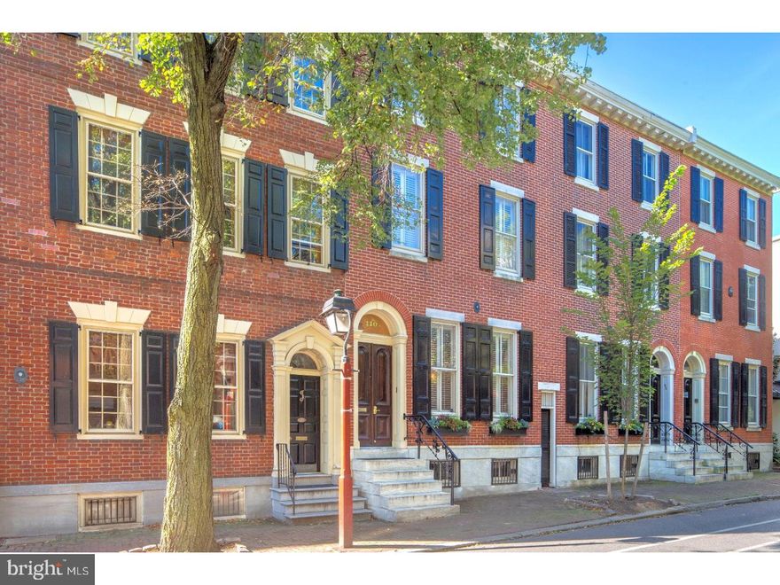 A+ location for this light-filled historic residence with GARAGE PARKING. This pristine townhome offers 3 bedrooms, a comfortable family room, 3.5 baths, and a full finished basement that includes a 4th bedroom, full bath, and a separate living area/den/playroom. This mid-19th century Italianate home is beautifully renovated with a stunning, spacious landscaped rear yard (34.5 x 19.5) and 1-car Parking (this secure garage parking is literally just feet from your front door. This is the seller's spot, it is not pre-paid or rental parking). Hardwood floors throughout, 11' ceilings, solid doors, original moldings and trim, and plantation shutters throughout. The beautiful custom kitchen is open to the dining room and overlooks tree-lined Pine Street. Solid wood cabinetry, black quartz countertop and bar, and just brilliant storage and pantry space. Huge living room with south-facing glass leading to the oversized yard. 2nd floor family room with south-facing walk-out terrace. Airy 2nd floor master suite with gorgeous marble bath. Two big bedrooms, full tile bath, and a laundry room on 3rd floor. Excellent storage. Dimmable lighting throughout. 110 Pine is a bright and stunning home on a quiet tree-lined Society Hill block. One block from the Headhouse Farmers' Market, so many great restaurants, and close to all that Society Hill, Old City, Penns Landing, Queen Village, and all of Center City has to offer. Note: Space No. 38 is a prime space in the 410 at Society Hill Garage. The space is immediately next to the secure entrance door, which is just feet from 110 Pine. This space comes with the home and stays with the home. Easy in and out. The maintenance fee for the garage space is $40/month.