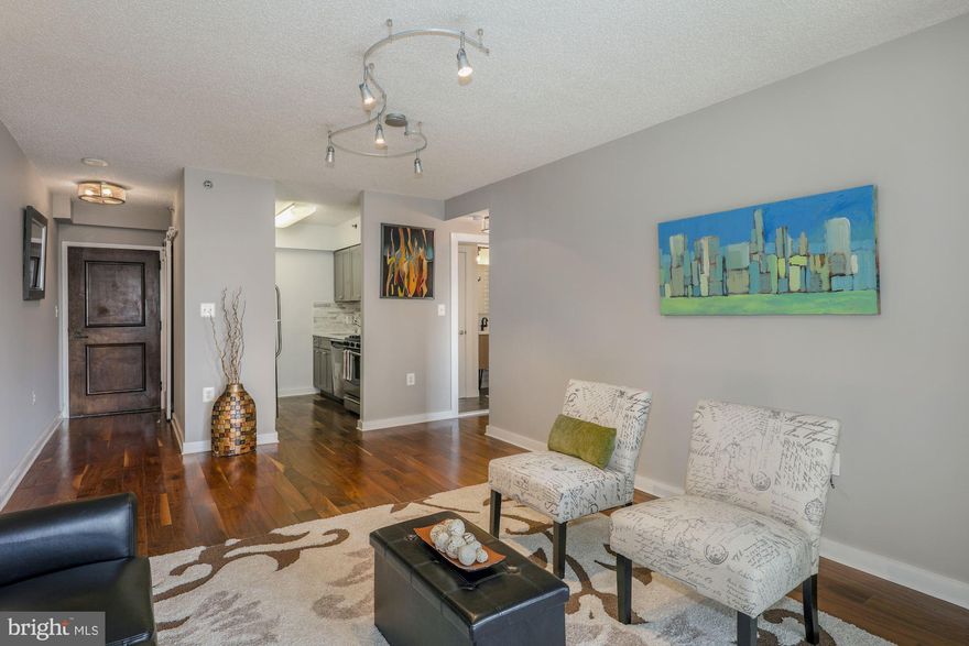 Located in the heart of Bethesda's Woodmont Triangle everything you need is within walking distance. Steps away from the new Marriott HQ, over 20 restaurants, coffee shops, and just over .25 miles to the Bethesda metro station. Corner unit with recent updates including hardwood floors, kitchen, and bathroom! Private balcony, in-unit washer/dryer, a large bedroom with a walk-in closet, including custom ELFA unit, and hardwood floors throughout. The building is secure and garage parking is available to rent. The building is pet-friendly.