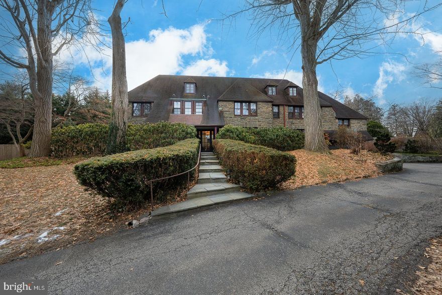 Welcome to 109 Ringwood Rd, a stunning home in Bryn Mawr on a quaint private street. This unique Norman-style all-stone home features six bedrooms, 5 full bathrooms plus two powder rooms. There is over 4500 square feet of living space on two floors,  and another 685 square feet finished on the lower level. 

Upon entering, the home's grandeur is evident in the wide transverse foyer with high ceilings accentuated by elegant crown moldings, a striking turned staircase, and a quaint powder room accentuate the home’s functional elegance. The sophisticated ambiance is further enhanced by the warm glow of wall sconces and classic chandeliers, and complemented by recessed lighting. Original and newer hardwood floors abound throughout the first floor, and relaxation awaits in the lovely, sunny fireside living room.  The classic formal dining room features built-in corner cabinets, and chair rails and comfortably accommodates a large dinner party.   

A Gardner/Fox redesign and build-out began with the butler's pantry/wet bar complete with a beverage center and second dishwasher and is adjoining the heart of the home, its kitchen. This culinary haven is equipped with a striking cobalt blue 48" Blue Star range & matching range hood featuring a double oven, gas cooktop, and adjacent polished black slate tops. The open kitchen design features a breakfast nook with built-in seating and a lovely center island finished in Quartzite with seating space suitable for five. An opened back stairway accesses the second-floor bedrooms and a full bathroom, while yet another open stairway leads downstairs to a smartly designed mudroom, laundry, and ample storage closets with a doorway leading to the attached two-car garage. French doors off the kitchen lead to the fenced backyard, and the walk-out daylight basement is finished and includes a convenient powder room, a large storage closet, and a large utility room. 

The primary suite is highlighted by a lovely ensuite bathroom, featuring a custom double bowl vanity, a freestanding soaking tub, a luxurious marble shower, with a private toilet, and an enormous walk-in closet with custom shelving, ensuring a place for everything. Two additional large, ensuite bedrooms complete the second floor, with two additional bedrooms and one full bath on the third level.  

The home offers year-round comfort with central AC, comfortable steam radiator heating, and radiant heating in some floors. 

Experience the pinnacle of luxurious living at 109 Ringwood Rd, a perfect blend of old-world charm, elegance, and practical modern-day amenities.