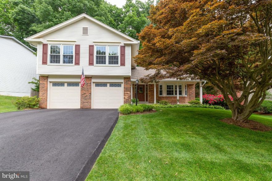 Charming and spacious 4 bedroom, 2.5 bathroom home on quiet street in coveted West Springfield.  Feeds to highly rated Orange Hunt Elementary, Irving Middle, and West Springfield High School.  MOVE RIGHT IN!  Freshly painted throughout.  This house has gorgeous landscaping and a large backyard patio overlooking private treed grounds.  It also features a 16'x20' screened in porch with Azek decking that is low maintenance, and split, scratch and stain resistant.  GORGEOUS!
 The remodeled kitchen features granite countertops, spacious cabinets, surrounding accented backsplash with under cabinet lighting, display cabinets, and large central island.  It opens to the family room which features a wet bar with painted cabinets and granite countertops, a cozy fireplace and outdoor access.
The main level also has a formal living room, formal dining room, both with crown moulding, and a completely renovated powder room with new toilet, vanity with brushed nickel lighting fixtures and hardware, exhaust fan and lighting, and LVT flooring.  Gorgeous hardwood (Amendiom) floors throughout the first and second floors.
Upper level is home to 4 nicely sized bedrooms.  The primary bedroom has crown moulding, a walk-in closet, a double closet and a linen closet and en suite bathroom.
Upgraded hall bath has ceramic tile and grab bars.  
Lower level space has a nice finished room with berber carpet and a 360 ft of unfinished/storage space with washer/dryer and sink.  
There is a 2 car garage with remote controlled door openers and outside password controlled garage door opener.  

The home also features : UniFrame custom vinyl windows and sliding glass doors with lifetime guaranteed construction quality, unmatched energy efficiency and low maintenance.
Precision entry doors with 20 gauge steel with insulated frames on home entryway, rear entry to kitchen and entry to garage.  Backyard High Colonial Gothis Pressure Treated Long Fence is 194’ in length and was built in 2016

Roof was replaced 2009 with XT 30 CertainTeed Traditional 30 year Shingles.  HVAC and Heat pump installed 2013.  New asphalt driveway done in 2020.  50 gallon water heater installed 2019.  

Notes: Additional washer/dryer hookup is in family room next to half bath.  Hook ups for telephone land lines  on all 3 floors.  There is an attic fan on thermostat.  Windows installed 1996.
Just minutes to shops/restaurants and Orange Hunt Elementary! Walk to metro bus stops. Front door bus service to the Pentagon/DC.  Minutes to VRE, Metro, FFX parkway, 495/95/395, and Springfield Town Center.  Beautiful home and fantastic location. WELCOME HOME!