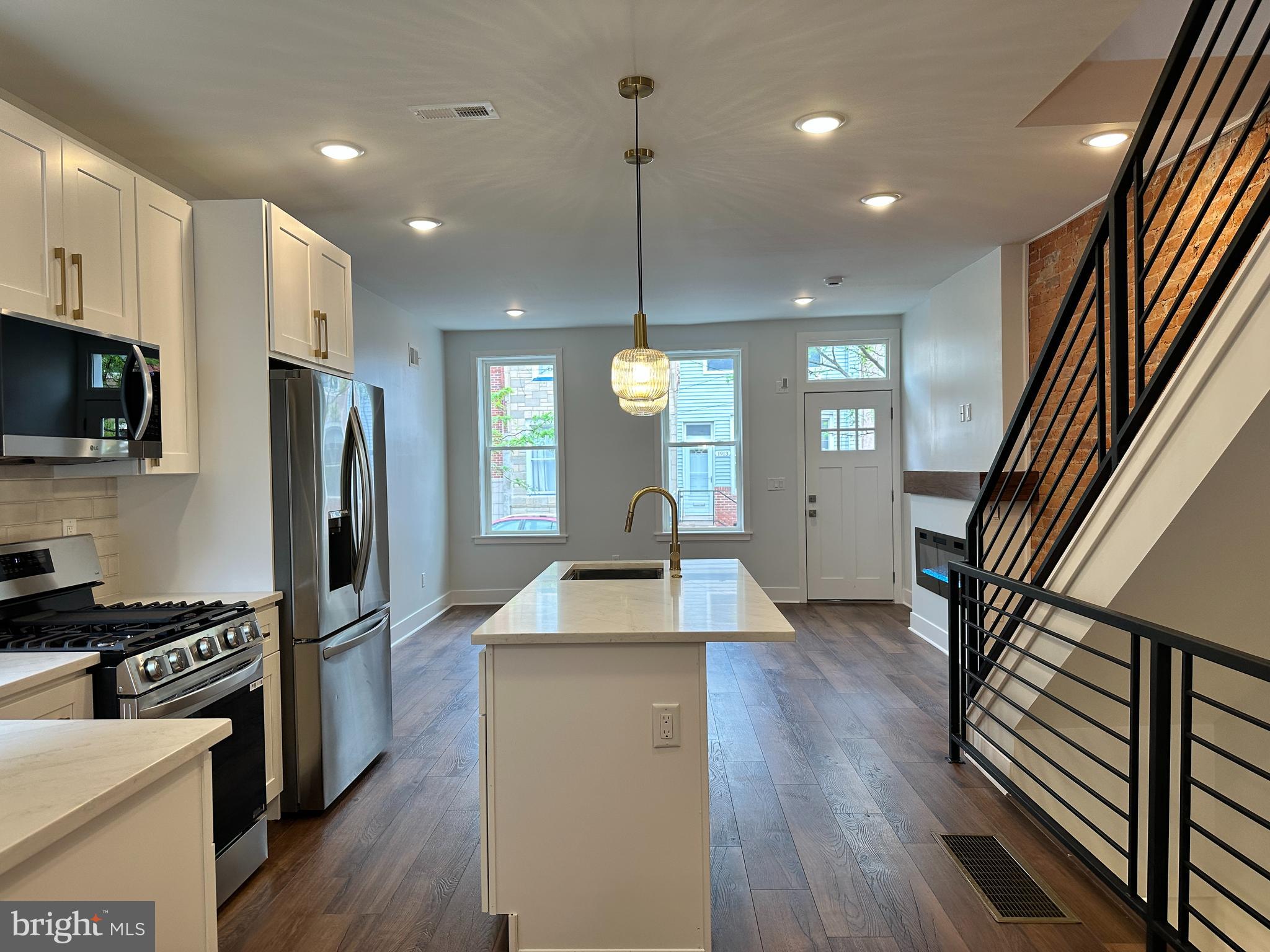 Stunning fully renovated 4-bedroom home with 3 full bathrooms in the heart of Point Breeze.
Welcome to 1914 Federal Street — a beautifully renovated (2025) 4-bedroom, 3 full bathroom home located in the thriving Point Breeze neighborhood of Philadelphia. This property offers a perfect mix of style, space, and high-end finishes across every floor.
Completely reimagined with all-new systems and premium upgrades, the home features brand-new plumbing, 200-amp electrical service, and energy-efficient double-hung windows throughout. The open-concept layout is designed for modern living with luxury vinyl plank flooring, quartz countertops, stainless steel appliances, recessed lighting, and a built-in electric fireplace that adds both warmth and style to the living area.
The kitchen is outfitted with thoughtfully selected, high-performance appliances, including a smart Wi-Fi enabled gas range with AirFry, a counter-depth French door refrigerator, and a QuadWash stainless steel dishwasher — all finished in PrintProof stainless steel.
All three full bathrooms are styled with modern tile work and elegant finishes. Three of the four bedrooms include ceiling fans, offering both comfort and convenience. The finished basement provides flexible space for a guest suite, gym, or media room, and includes a dedicated laundry room with a utility sink.
Step outside to a newly poured concrete backyard with a brand-new privacy fence — perfect for relaxing, entertaining, or creating your own urban garden. Additional features include a Google Nest Thermostat and an A.O. Smith Signature 300 smart electric water heater with leak detection.
Enjoy peace of mind with a pending 10-year tax abatement and a one-year home warranty included with the purchase.
Don’t miss the opportunity to own this thoughtfully updated home — schedule your tour today! Property easy to show.
Seller is a licensed real estate agent in Pennsylvania.