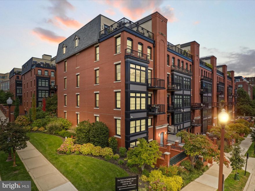 Experience refined urban living at Gaslight Square, one of Arlington’s most prestigious addresses. This stunning 1 Bedroom + Den, 2 Full Bath residence offers direct private elevator access to a beautifully appointed one-level corner unit. The sun-filled open floor plan features 9-ft ceilings, engineered plank wood flooring, and a spacious living room with private balcony—perfect for morning coffee!
The chef’s kitchen impresses with an oversized quartz island, Wolf gas range, Sub-Zero refrigerator, Asko dishwasher, and glass-front cabinetry. The primary suite includes a custom walk-in closet and a luxurious bath with oversized shower and elegant finishes. The den can serve as a guest room or home office, paired with a second full bath for flexibility.
Enjoy the convenience of two reserved garage parking spaces plus extra storage. Offered furnished or unfurnished, this exceptional home provides the best of both worlds—tranquil privacy and unbeatable proximity to Rosslyn & Courthouse Metros, Clarendon Blvd dining, shops, and Reagan National Airport.