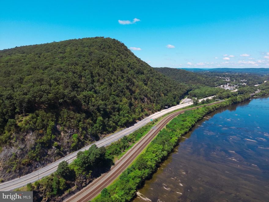 Located in Perry County, Pennsylvania, this 17-acre property offers both recreational and residential potential with scenic views of the Susquehanna River. Zoned Forest Conservation, it allows residential and recreational uses but not billboards. About half the acreage is steep, supporting wildlife habitat, while roughly 5 acres are more level and may suit a homesite.

The property has a history of strong hunting opportunities thanks to its terrain and proximity to State Game Lands #170. Hunters benefit from hiking uphill to hunt with easier drags downhill.

Access is by deeded right-of-way through 25 Spur Road. Drive-bys are not possible, and all showings require an agent. A secondary access point exists on Inn Road, though it is very steep.

From several vantage points, owners can enjoy river views and nights under the stars. Whether with a camper or tent, the property provides an excellent spot to experience the South Central Pennsylvania night sky. Its location near State Game Lands adds more opportunities for hiking, camping, and wildlife observation.

For investment-minded buyers, an additional 5.5-acre parcel (MLS# PAPY2008090) bordering the Susquehanna River and Sherman’s Creek on Inn Road is also available. Purchasing both creates an expanded footprint with added flexibility.

Utilities are not currently on site, and buyers should confirm availability as well as doing their own due diligence if building. Rely on your buyers agent to assist you or if you are not working with an agent, contact the listing agent directly. This tract combines scenic views, hunting, camping, and homesite potential while remaining convenient to Duncannon (5 mi), Marysville (10 mi), Harrisburg (18 mi), and Mechanicsburg (25 mi).
