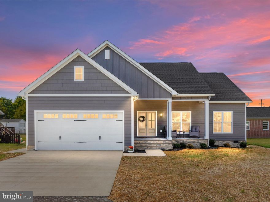 **** Builder is in the process of constructing a 10x16 shed to match the house!    New Custom Built, Beautiful One-Level Craftsman style home with approximately 1600 sq feet, sits on a quiet no-thru street. It is located within walking distance to Downtown Strasburg with lots of shopping/dining and events throughout the year!  You are close to the Town Park and Pool and there is NO HOA!  Less than 3 miles to Interstate 81 and less than 5 miles to Interstate 66! 

The LP Smart Siding Engineered Wood Siding is known for it's resistance to impact and moisture!  Stone foundation all the way around the home!  York Heat Pump comes with a 12 Year Equipment Warranty with WIFI Thermostat!  Motion sensor lights in front and rear of property.  Enjoy the 8x18  (each),  covered concrete flooring, front and back porch (back porch has a ceiling fan with remote).  The Oversized Garage with an 18ft Garage Door with plenty of room for additional storage, as well as a drain to catch the rain/snow from your vehicles. Floor and walls are finished and painted.  There is a Pedestrian Side Door to the garage as well.

Double front doors with privacy glass enters into the Living Room with Tray ceiling, custom beams and a ceiling fan with remote. You will appreciate the 10ft ceilings!   Enjoy the open concept living with beautiful laminate flooring throughout!   Both Bathrooms are tiled.  There is NO carpet.   The Kitchen is custom created and detailed oriented for your every need.  Stainless Appliances (downdraft Kitchen Aid stove in island), Quartz Countertops, Backsplash, Island with available seating, Custom upgraded cabinets with soft closed drawers, appliance garage, spice cabinets, & a special cabinet just for your mixer!  Under Counter and In-Counter special lighting.  

The Mudroom/Laundry Room is conveniently located off the garage.  There is a hook up for your washer and dryer and a custom built Farmhouse Hall Tree with plenty of storage opportunities!

The Primary Bedroom is on one side of the property and the 2 additional bedrooms and bath are on the other side of the home.   All Bedrooms have 9ft ceilings, and all have ceiling fans with remotes!  The Primary has a Tray Ceiling, wood shelving in the large walk in closet and a Barn Door that leads to the primary bath.  The primary bath has 2 sinks, custom tiled shower and a water closet.  

Custom Painting,  Custom Tile, Custom Trim Work, Recessed Lighting,  and numerous upgrades and finishes that you normally don't see with new construction. **** $2,000.00 lender credit when using preferred lender of builder****  The GPS is not working for this property.  If you use GPS, please enter 176 Virginia Street, or follow the directions: From Downtown Strasburg, travel East on Rt. 55/East King Street to Right onto Virginia Street.  Property is on the Right.