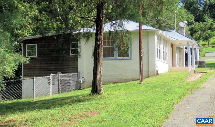 Possible Owner Financing Offered. This hidden community of 4 homes, walkable�to Historic Downtown Scottsville, now has an opening! There was a cannery that the previous owners chose to save and upgrade into the present 2 bedroom, 1 bath bungalow�with a view of the every running bubbling�creek. Seeking a retreat from today's noise, this will be a must see!