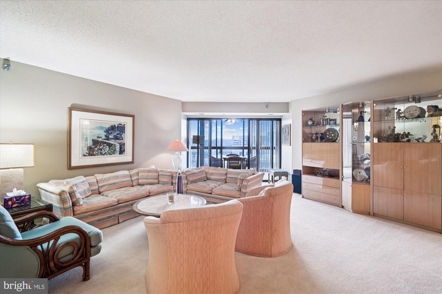 Step into unparalleled resort-style living with this rare "S" Model residence where practicality meets premium convenience. This condo includes a highly sought-after reserved indoor garage parking space that conveys with the sale of the condo! And for your convenience, an in-unit washer and dryer. 

With approximately 1,400 of expansive living space, the condo is perfectly situated within the premier 55+ gated community of Leisure World. Designed for comfort and grace, the condo boasts two-bedrooms with en-suites, ample closet space, and complemented by a versatile private den, offering exceptional flexibility for guests, hobbies, or a dedicated home office.

The condo boasts a tranquil four-season enclosed sunroom finished with carpeting, and a ceiling fan. It is your ideal retreat for quiet contemplation and year-round enjoyment, shielding you from the elements while preserving the breathtaking view.

Beyond your wonderfully appointed residence, the Leisure World experience awaits. Enjoy the peace of mind of 24-hour security and dedicated transportation services, while immersing yourself in world-class amenities: restaurant, golf golf, fitness centers, indoor and outdoor pools, tennis courts, walking and biking trails, shuttle service, and an endless array of activities.

Close to shopping, dining, parks, and MedStar Health, this is an opportunity to secure the spaciousness you desire and the vibrant, resort lifestyle you deserve. Don't miss the chance to make this serene sanctuary your home. Schedule your private showing today!