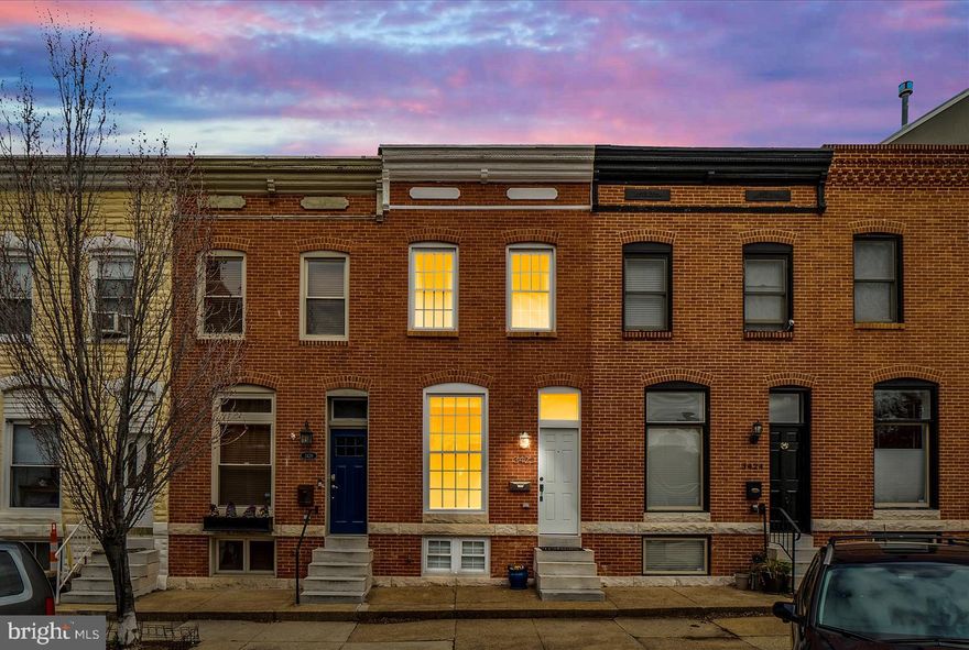 Stunning 2 bedroom, 2.5 bathroom row house, with an abundance of parking! This amazing location in the heart of Canton is within walking distance to some of the most popular local hotspots including Canton Crossing, Canton Square, Patterson Park and the Waterfront! Home features exposed brick, brand new front & back doors, Kitchen with a beautiful new Quartz countertop, stainless steel appliances, gas stove & real hardwood floors throughout. The second floor has a bright white, recently updated Master Bathroom featuring a soaking tub with jets and separate shower stall. Spacious Master Bedroom offers lots of natural light & 2 separate closets. The second bedroom includes a half bath as well as a wall-to-wall, 13 foot built-in California closet! French doors in the 2nd bedroom open to a Treks composite deck perfect for morning coffee! Additionally, the basement is finished, fully carpeted, with a full bathroom and laundry room. Ample parking on quiet street, additional parking lot across street, and its own 1-car parking pad! Minutes away from 895 & 95 making your commute a breeze! Home is very well maintained, shows beautifully and won't last long, schedule your showing today!