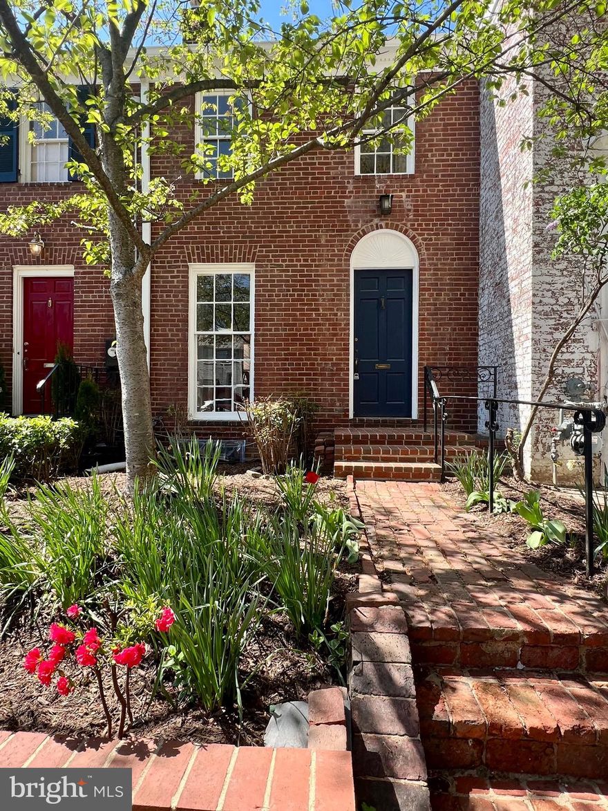 Old Town Charm Meets Modern Luxury – 719 S. Pitt Street
Welcome to 719 S. Pitt Street—where timeless Old Town character meets fresh, sophisticated living. Nestled in one of Alexandria’s most coveted neighborhoods, this fully remodeled three-level townhome offers over 1,200 sq. ft. of beautifully finished living space, seamlessly blending classic charm with modern comfort and convenience.
Step inside to find refinished hardwood floors with elegant peg detailing, beautifully paired with oversized windows that fill the home with natural light. The open-concept kitchen is a true showpiece, featuring Calacatta quartz countertops, an island breakfast bar, all new stainless steel appliances, and floor-to-ceiling white cabinetry with crown molding. The layout flows effortlessly into the adjoining dining and living areas—perfect for both everyday living and entertaining.
Upstairs, you’ll find two lovely bedrooms, each filled with natural light and offering generous closet space—a rare advantage in similar Old Town row homes. A newly renovated full bath with modern finishes and a luxurious walk-in shower with rain and handheld shower heads completes the upper level.
The fully finished basement offers flexible living space—ideal for a home office, guest suite, or cozy retreat—and includes a second full bath, also thoughtfully updated with stylish fixtures and another walk-in shower.
Additional highlights include all-new recessed and overhead lighting, a dedicated laundry closet with a full-sized stackable washer-dryer unit, and abundant storage throughout the home, including several newly added closets that make the most of every inch.
Step outside to your private, fenced rear patio and garden, lined with mature trees—a peaceful setting for evening relaxation or weekend gatherings. A true backyard oasis. Your designated on-street parking space, located directly in front of the home on a boulevard-style street with a tree-lined median, adds everyday convenience and undeniable curb appeal.
Located just steps from shops, Balducci's, nearby parks, Potomac River, bike/walking path, and some of Old Town’s best restaurants—and a short stroll to King Street and Jones Point Park—this home offers the best of vibrant, walkable Alexandria living. It’s also ideally situated near public transportation and major commuter routes, including Route 1 and I-495, making it an exceptional location for those on the go.
Don’t miss this rare opportunity to enjoy modern luxury in one of Old Town’s most beloved residential settings. *Owner is a licensed Virginia Realtor. **Anticipated Date on Market for Showings is 4/25/25. Please check back for updates!