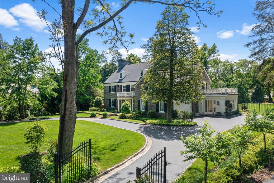 Introducing an exquisite classic Main Line home built by renowned builder Pasquale Beccia, constructed in the prestigious North Side Haverford. This captivating 3-story 5,426 sq foot stone Colonial boasts 6 bedrooms, 5 full and 2 half baths, 3 fireplaces, chlorine heated pool, spa and pool house and features timeless features throughout.  Rarely does a property like this become available.
Welcome to luxury living, where elegance meets tranquility amidst lush landscaping on an acre of land in the coveted "Merion Cricket" neighborhood. A rare gem, this residence is within a leisurely stroll to trains, clubs, esteemed public and private schools, upscale shopping, and fine dining.
Approach via the cobblestone-lined circular driveway, embraced by mature trees, setting a serene ambiance. Step inside to an inviting foyer, where timeless charm unfolds. This sun-drenched home exudes grace with spacious rooms, original restored floors, and intricate architectural details such as deep window sills, arched doorways, custom built-in cabinetry and intricate moldings. 
The flow of the home is perfect for comfortable everyday living and effortless entertaining on an intimate or larger scale. Entertain effortlessly in the inviting living room with fireplace, elegant dining room with arched doorways, and a refined wood-paneled office. The renovated white gourmet kitchen features custom cabinetry including glass front cabinets to showcase dishware and glassware, natural marble countertops and top of the line chef's appliances. The kitchen opens to a stunning, sunny breakfast room with walls of windows on three sides and a window seat overlooking the entire property.  French doors from the kitchen and living room lead to exterior terraces and a covered porch, offering serene views of the surroundings. The formal powder room with vestibule and convenient mudroom complete the main floor. 
Ascend the grand staircase or convenient back stairs off the kitchen to discover a 2nd floor luxurious primary suite with expansive walk-in closet/dressing room, two primary baths with vanities, and an oversized frameless glass shower. On this level are 3 additional second floor bedrooms with 2 additional updated full neutral-tiled baths. The 3rd floor features two additional large, bright bedrooms and an updated full hall bathroom. 
The walk-out lower level offers lots of natural light and is perfect for relaxation, featuring a family room with fireplace, half bath, and a spacious laundry room, with two staircases from the main level. Abundant storage and easy access to the rear grounds complete this level.
Outside, experience resort-style living with formal gardens, an expansive backyard, vibrant flower and herb gardens, and extensive hardscaping. A magnificent pool with a flagstone terrace and a charming pool house with a full bathroom (6th full bath for home) elevates outdoor entertaining to new heights.
Luxury knows no bounds in this remarkable estate, where every detail exudes sophistication and serenity. Experience the epitome of Main Line living at its finest. MISSING PICTURES ON LOWER LEVEL AND REAR YARD TO COME!Taxes are$30,556, incorrect amount in MLS. Inspection report online.