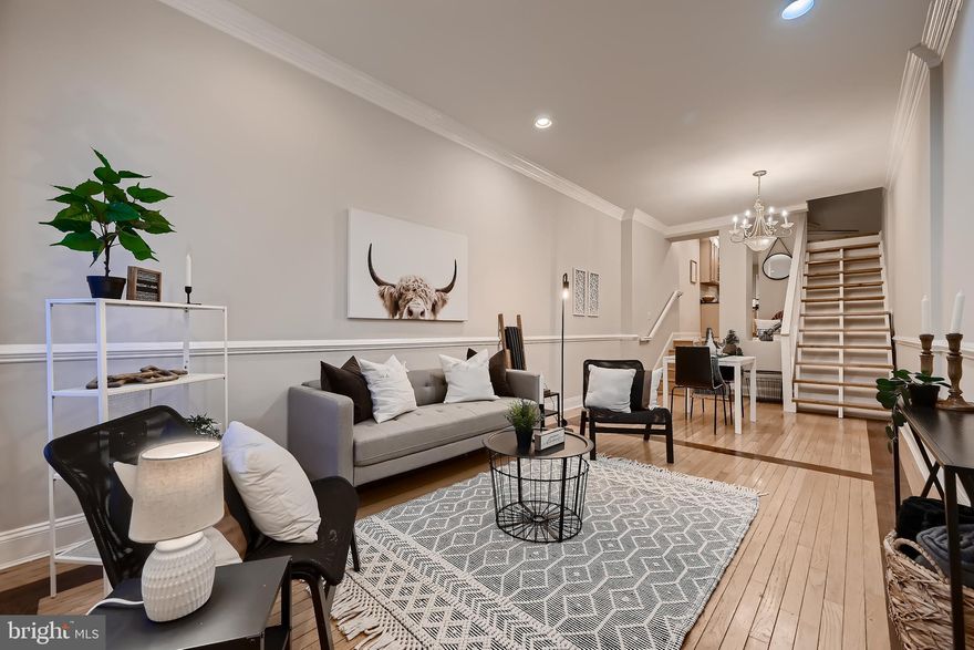 ATTENTION JOHN HOPKINS Staff and Alumni You are eligible for FREE MONEY Grant programs here at this Large townhouse in the Butcher's Hill/Patterson Park! I have been in contact with JHU Human Resources who has an abundance of grants and programs for you that this house specifically qualifies for. This beautiful home is 1920 sq. ft. with 3 levels of living space just for your liking! This home is walking distance to Johns Hopkins Medical campus, Patterson Park with gorgeous views! Its also close to  Downtown and Fells Point . This home is the perfect house for a family with children and first time home buyers. This house is priced to sell! The main level as you walk in is filled with natural light and has a spacious living and dining  area. The huge UPDATED kitchen boasts a breakfast room, a breakfast bar and a half bath for guests too. The upper levels have 3 bedrooms with one of which could be an office area! This home has a hallway bath and a laundry area on the upper level. When is the last time you have seen a laundry room upstairs in Baltimore City? All hardwood flooring and tile throughout.  Out back the patio is spacious for a grill out whenever you see fit. Has unfinished basement as well for extra storage! Give me a call today and ask me about our "Holiday home buying special" and I will gladly tell you about the free money grant programs!