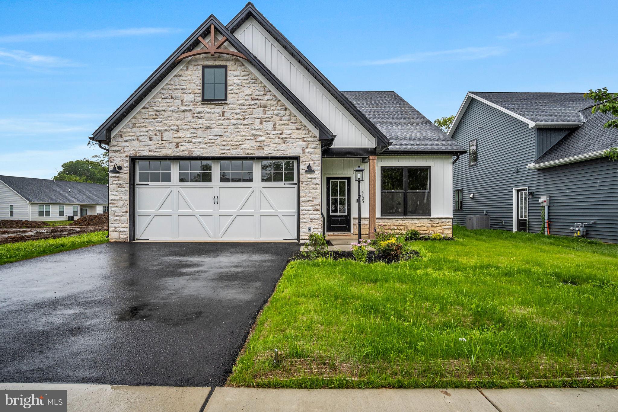 The newly finished Holly is a beautiful 3 bed, 3 bath, 2,103 square foot home found in Birch Grove, conveniently located in Camp Hill. The quaint cul-de-sac offers ample privacy while also being just minutes from Rt. 15. This home features first floor living with open concept kitchen, dining, and great room. The beautiful cathedral great room with full stone fireplace and windows flanking for ample natural light. The massive 18'x16' covered patio is located off of the great room. The kitchen provides a generous amount of cabinet space, quartz countertops, and a 6-foot island. Off of the kitchen is a laundry/mud room which leads to the 2-car garage. The first-floor owner's suite features a cathedral ceiling and includes a full bathroom as well as a walk-in closet. The first floor also includes a bedroom and full bathroom located off of the foyer. Upstairs you will find a bedroom with walk-in closet, a full bath, as well as a generous storage area.
This is one option to choose from to build. Our fully optioned custom home pricing ranges from the upper $400's for a single-story home or low to mid $500’s for a two-story with main floor living. Our “base” options included in that pricing are well above builder grade so, as an example, you don’t need to upgrade with an additional fee to get nice kitchen cabinets. All homes are optioned out with at least granite (model will have quartz), LVP flooring, soft close cabinetry, stainless steel appliances, Andersen 100 series windows, etc. all as a starting point. So, no worries about massive up charges on those prices to have a beautiful custom home. Call today to see if together we can build the home of your dreams!