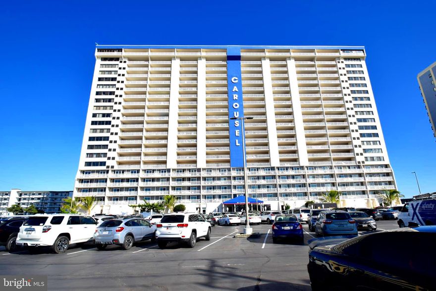 This is your opportunity to own in the famous Carousel building!  This direct oceanfront condo offers stunning ocean views while the building provides unmatched amenities.  The Carousel is a great place to vacation year-round with activities for all seasons. Relax by the outdoor or indoor pools, unwind in the game room or take a cruise around the famous indoor ice skating rink.  Enjoy a meal in the exclusive restaurant inside the Carousel after a day at the beach.  There is excellent rental potential!
The refrigerator was replaced in 2023, the water heater and washer/dryer were replaced in 2022.