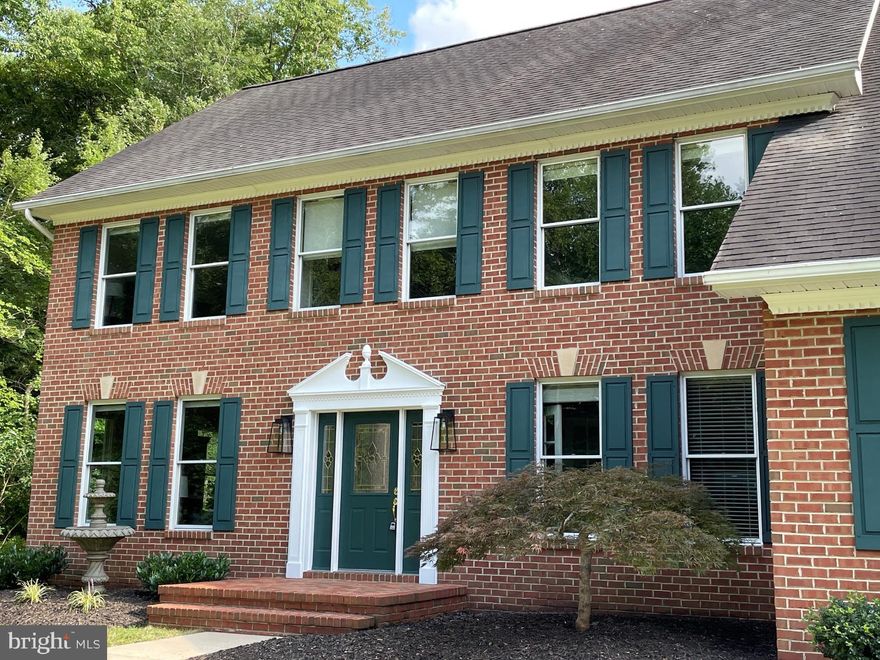 Price  reduced by 25k and offering a home warranty!!!
Lovely Davidsonville home on 2 ¼ acres with a home warranty
custom built by Baines Construction. Entry level has a large
kitchen with an island, granite countertops, an eat in kitchen, a
sizeable pantry and updated appliances, a spacious family room
with gas fireplace, mud room, hallway coat closet, half bath
with tile floor and pedestal sink. The formal living room, dining
room and home office have hardwood floors with abundant
natural light. Second level has four bedrooms with spacious
closets, three full bathrooms and a laundry room. Primary
bathroom has been renovated (completed Aug 2) with a
standalone tub, double sink vanity and frameless shower. The
finished walk out basement has ceramic tile floors, an
entertainment room, half bath, storage closets, and room for
whatever you need – a playroom for kids, a 5 th bedroom,
exercise room or another office. The two car garage is clean,         Seller just did 40k renovation  on master bath and Ready to make a deal!!!
spacious and ready for cars or additional storage. Year round,
outdoor entertaining can be done on the hardscape paver
patio. The shed has ample room for storing the lawn mower
and yard tools. Large backyard for a pool if desired. Owners
are downsizing and motivated to sell. It’s a must see! Schedule
a showing to see this lovely, well maintained, one owner home.. Upstairs has 2 master Bedrooms! Can do 5th bedroom in basement if needed and a seperate living area with its own door.