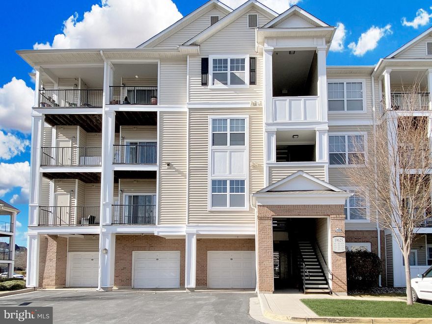 Welcome to modern living in a prime location! Perfect blend of comfort, convenience, and style, this exceptional apartment offers a spacious corner/end unit experience on the 2nd floor, nestled within the sought-after Ashmore community. The residence is bathed in sunshine, courtesy of the south and east-facing windows, ensuring a cheerful atmosphere throughout the day. Heating and AC replaced in July 2023, with a reassuring 10-year warranty.  Outstanding features of this apartment include lofty 9-foot ceilings, gleaming hardwood floors, elegant double crown molding,  thoughtfully designed built-in desk and bookcase, beautiful ceramic tile accents in the kitchen and bathrooms, a sizable deck, full-size front-load washer and dryer, expansive walk-in closet in primary bedroom, and a lavish primary bathroom that boasts a shower, tub, and large vanity with extra counter space. The award-winning community association  has a clubhouse, pool, fitness center, business center, and playground. The unit comes with two assigned parking spaces (388 & 389) and is available for move-in this September. Located near a host of dining and shopping destinations such as Wegmans and Target, and with easy access to I-270 and the Germantown MARC train station, this home is a haven for those seeking a dynamic lifestyle. This coveted apartment is ready for move-in this September – a perfect new beginning in a remarkable community.